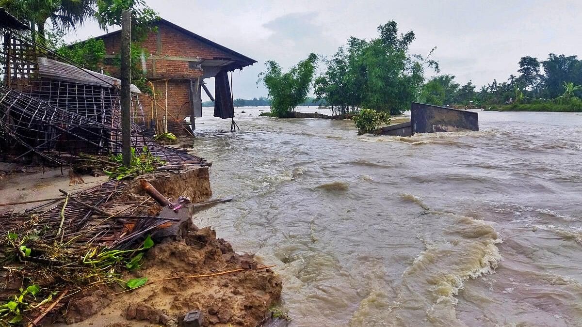 <div class="paragraphs"><p>Several houses damaged as the flood water makes its way, in Lakhimpur district, Assam.</p></div>