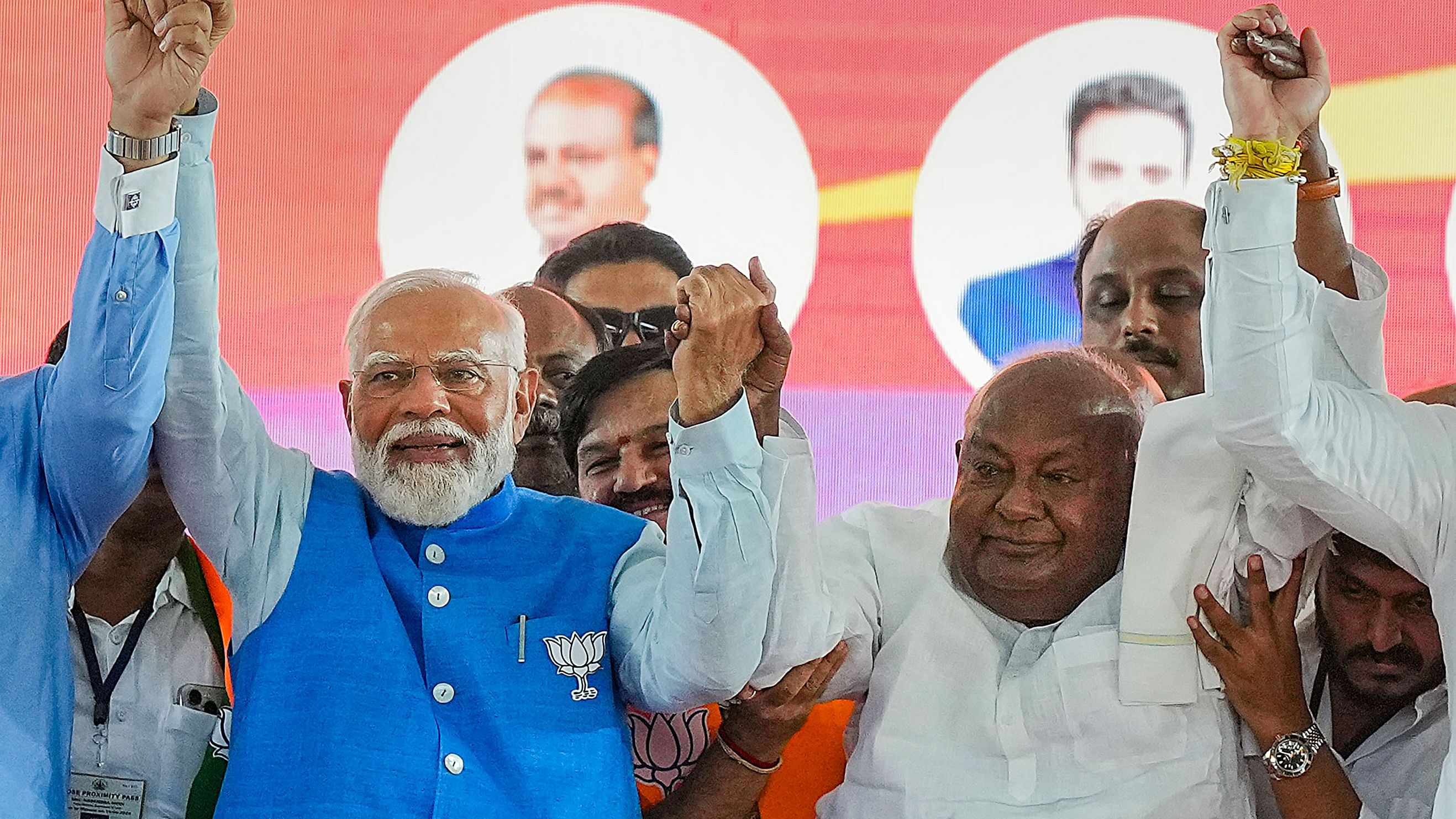 <div class="paragraphs"><p>Prime Minister Narendra Modi with JD(S) Supremo and former PM H D Devegowda during an election campaign rally ahead of Lok Sabha election in Mysuru, on Sunday.</p></div>