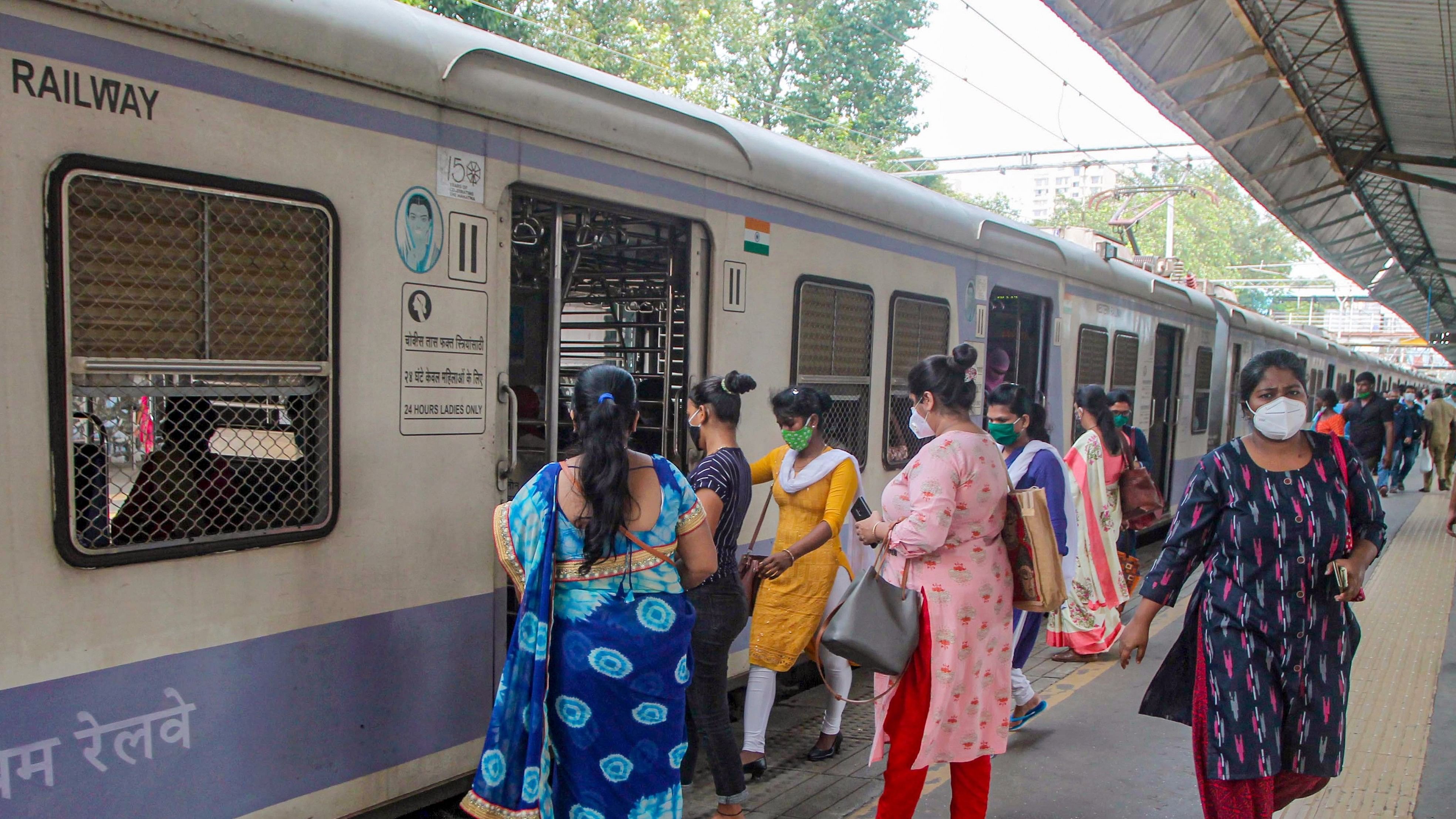 <div class="paragraphs"><p>File photo of passengers boarding a local train  at CSMT in Mumbai.</p><p>Representative image.</p><p> </p></div>