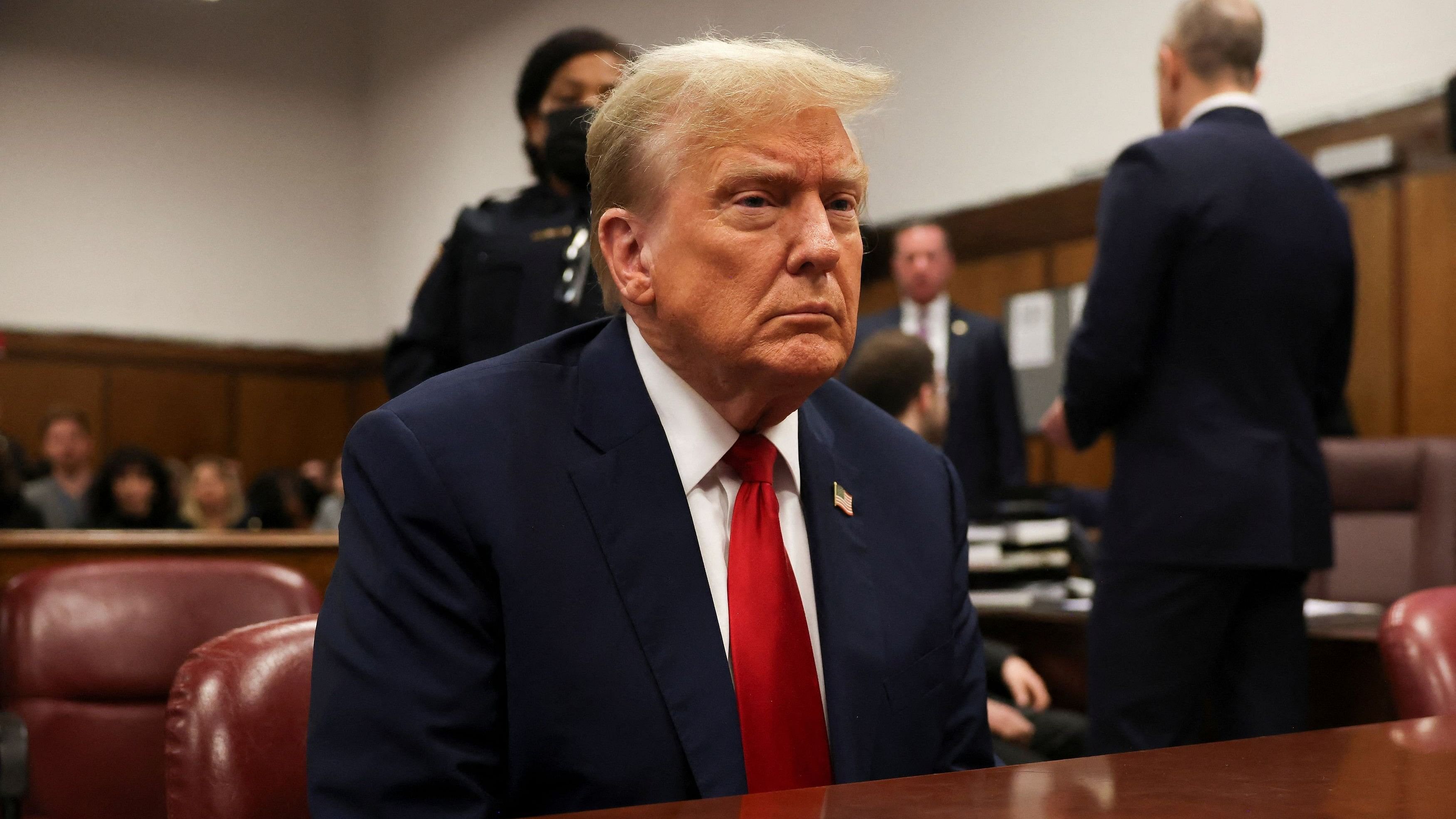 <div class="paragraphs"><p>Former US President Donald Trump waits for the start of proceedings in Manhattan criminal court, Tuesday, April 23, 2024, in New York. </p></div>