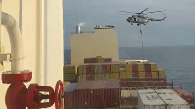 <div class="paragraphs"><p>An official slides down a rope during a helicopter raid on MSC Aries ship at sea in this screen grab obtained from a social media video released on April 13, 2024.</p></div>