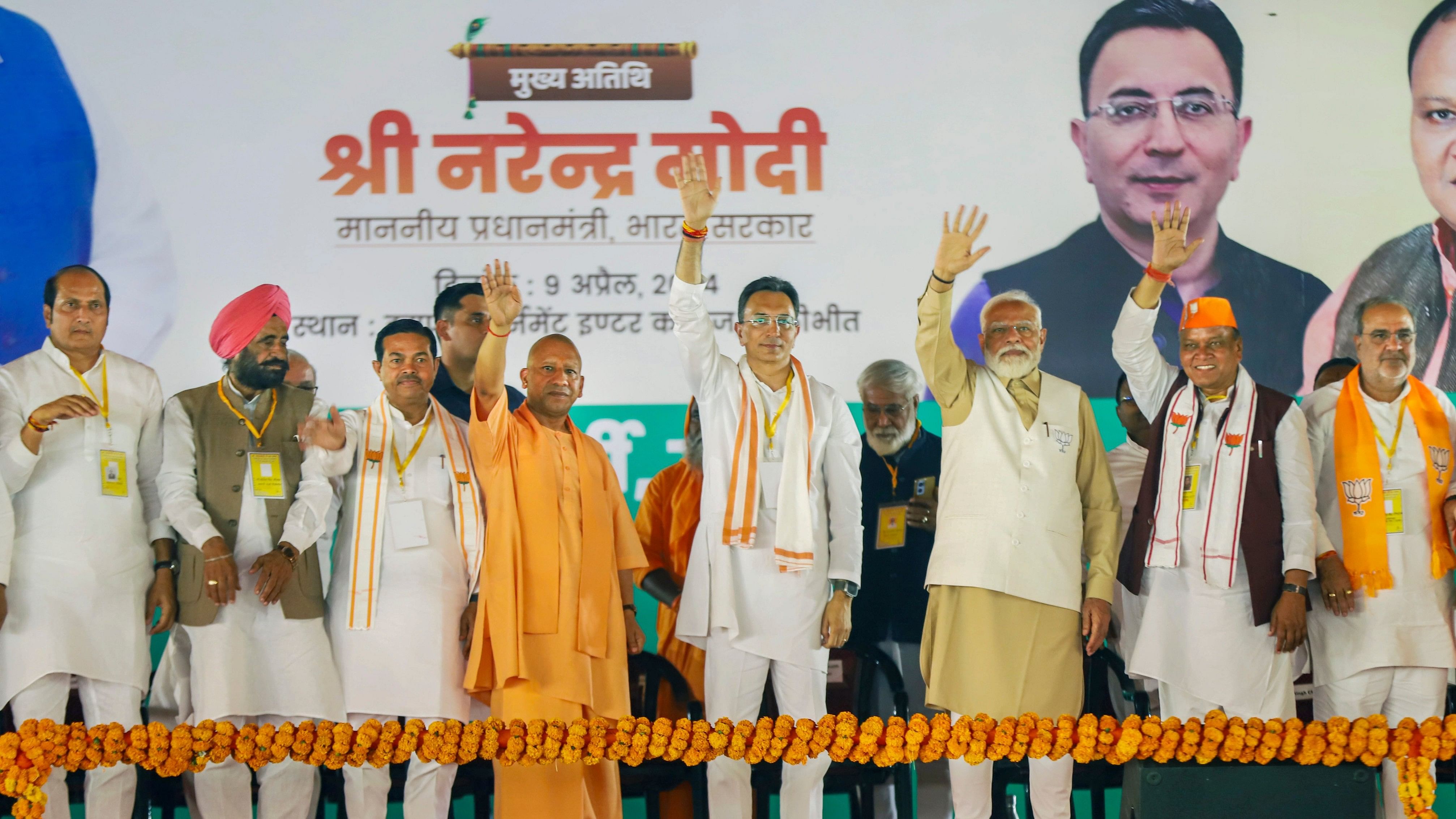 <div class="paragraphs"><p>Prime Minister Narendra Modi with Uttar Pradesh Chief Minister Yogi Adityanath, BJP leader Jitin Prasada and others during a public meeting ahead of Lok Sabha elections, in Pilibhit, Tuesday, April 9, 2024.</p></div>