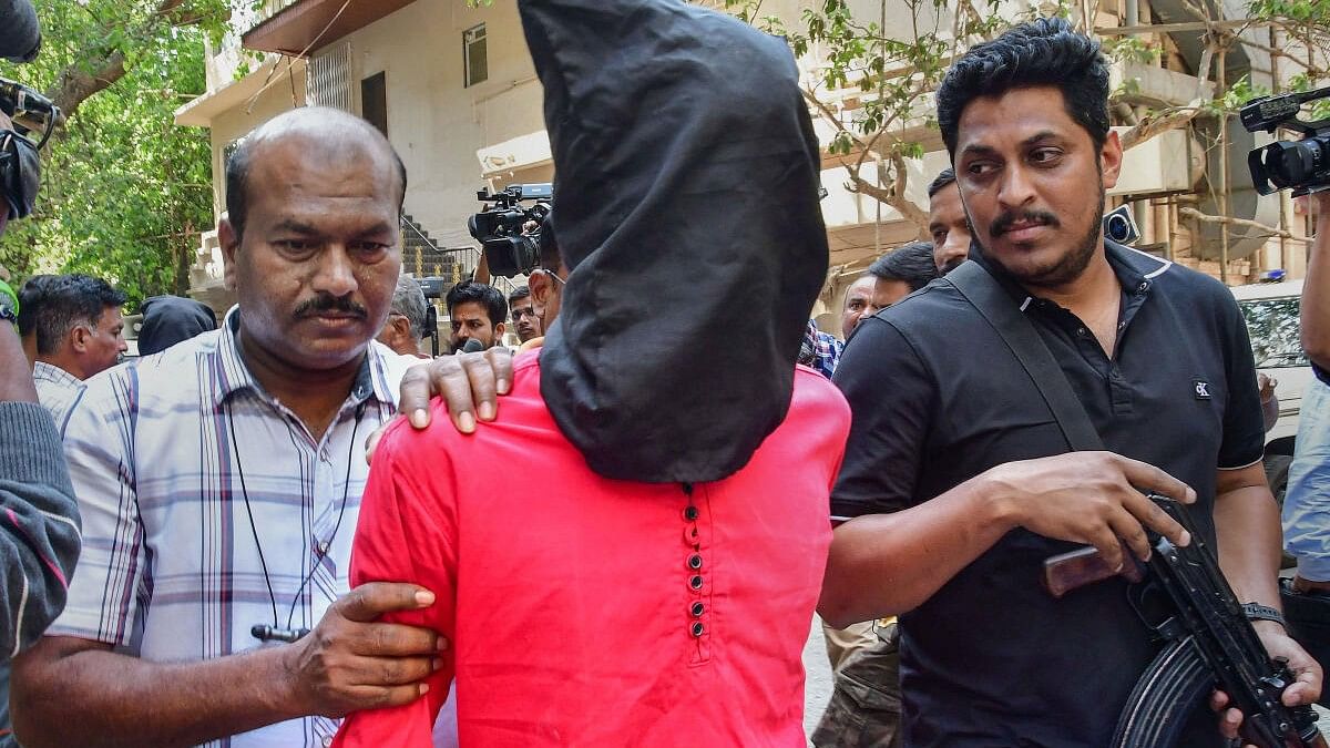 <div class="paragraphs"><p>One of the accused who  opened fire outside Bollywood actor Salman Khan's residence, being brought to Esplanade court, in Mumbai.&nbsp;</p></div>