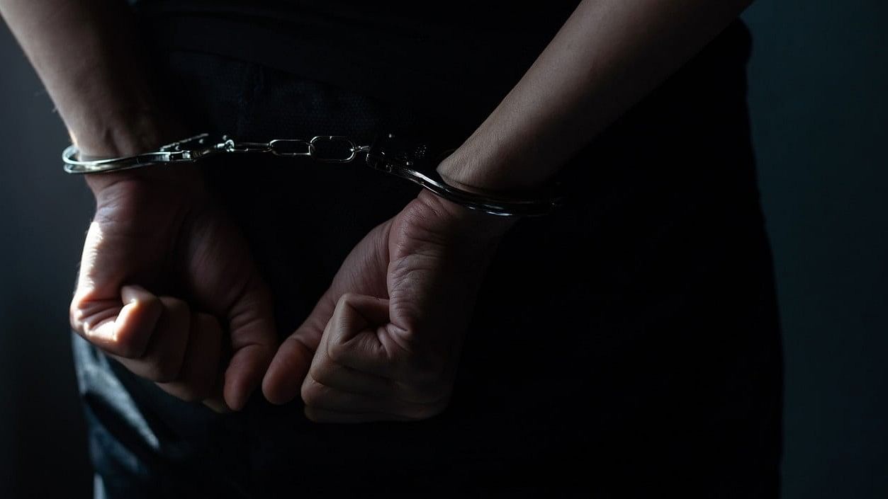<div class="paragraphs"><p>Representative image showing a man in handcuffs.</p></div>