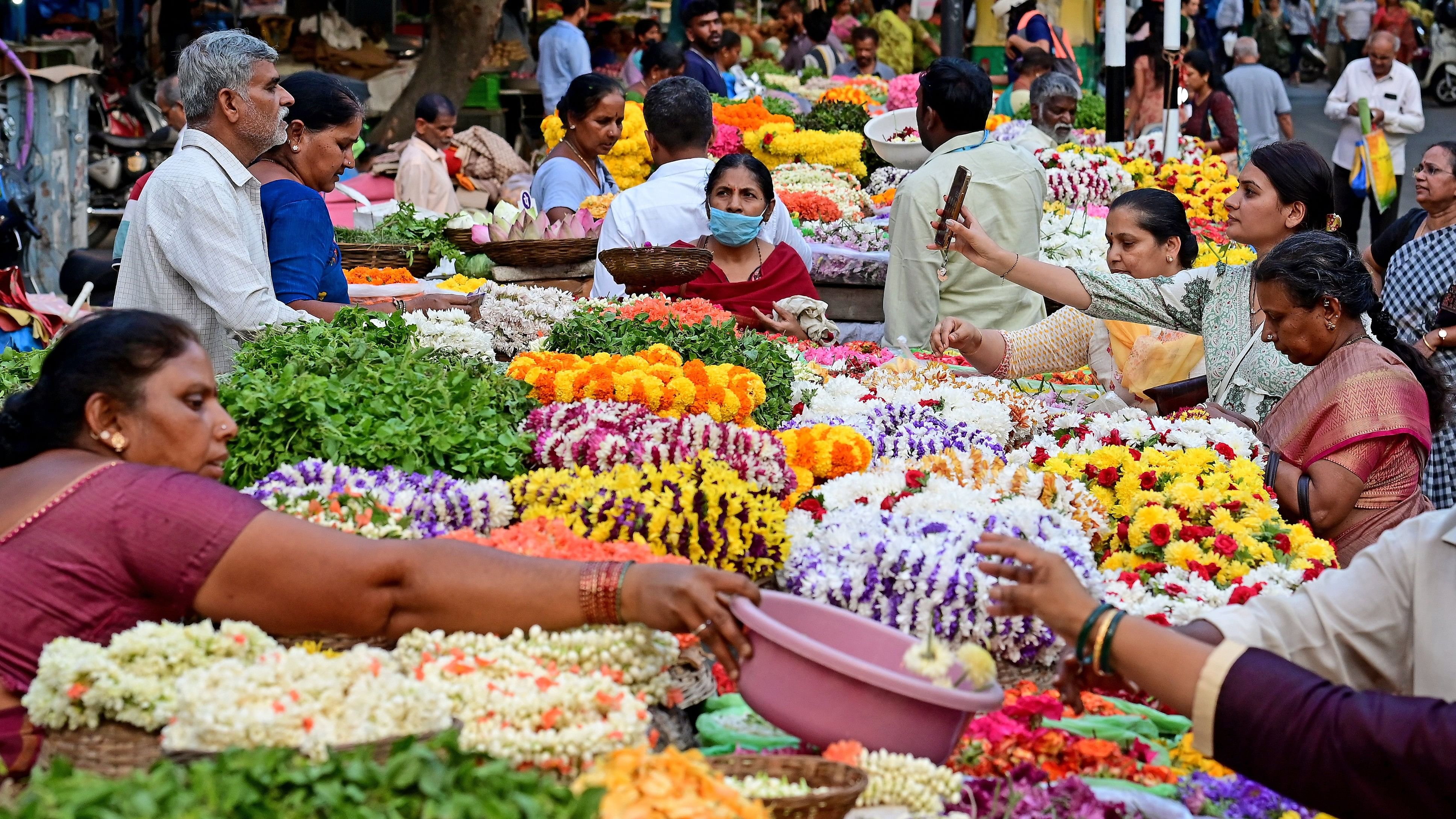 <div class="paragraphs"><p>On the eve of Ugadi on Monday, the flower market at Gandhi Bazaar wears a festive and vibrant look as people make last-minute purchases.</p></div>