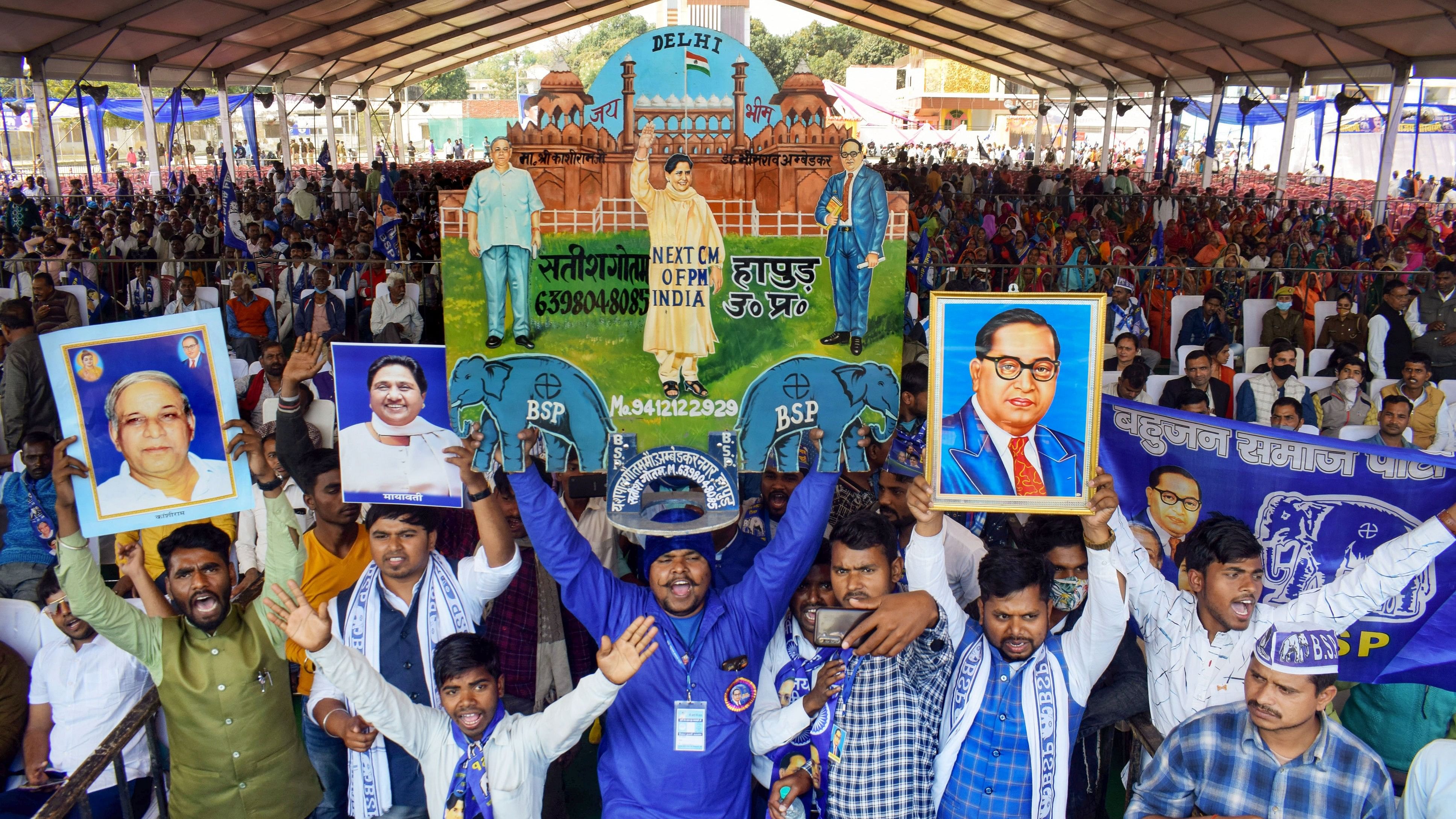 <div class="paragraphs"><p>File photo of supporters holding a placard of Bahujan Samaj Party (BSP) President Mayawati,</p></div>