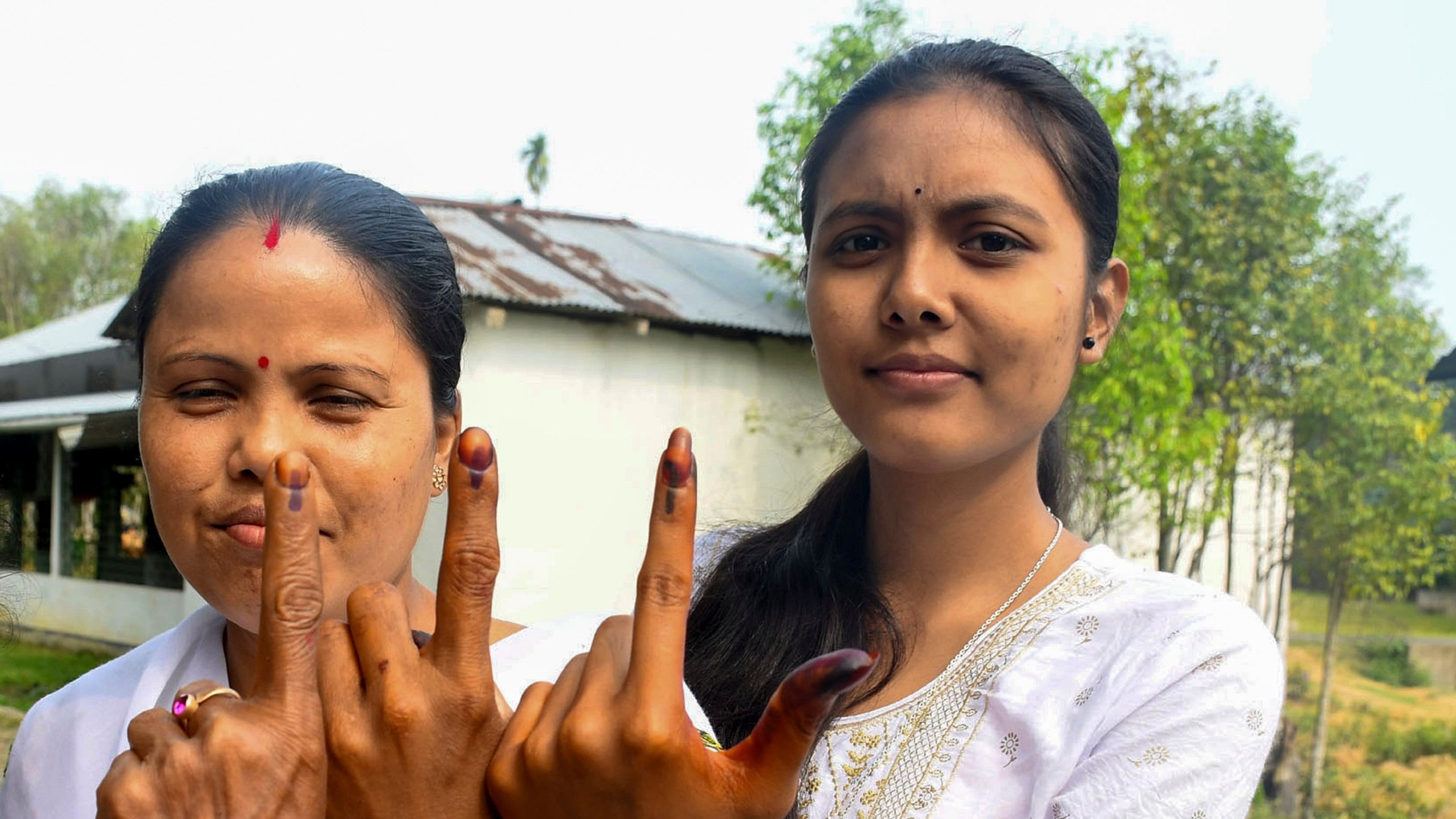 <div class="paragraphs"><p> Voters show their fingers marked with indelible ink after casting their votes for the first phase of Lok Sabha&nbsp;elections,&nbsp;in Sivasagar, Assam, Friday, April 19, 2024. </p></div>