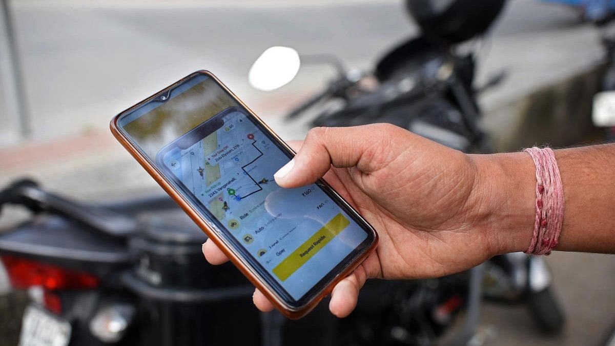 <div class="paragraphs"><p>Representational picture of a person booking on Rapido app in Bengaluru.</p></div>