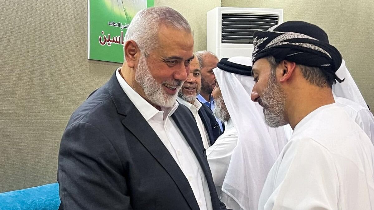 <div class="paragraphs"><p>Ismail Haniye, top leader of the Palestinian Islamist group Hamas, meets a person offering condolences after the killing of three of his sons in an Israeli strike in Gaza City, in Doha, Qatar.</p></div>