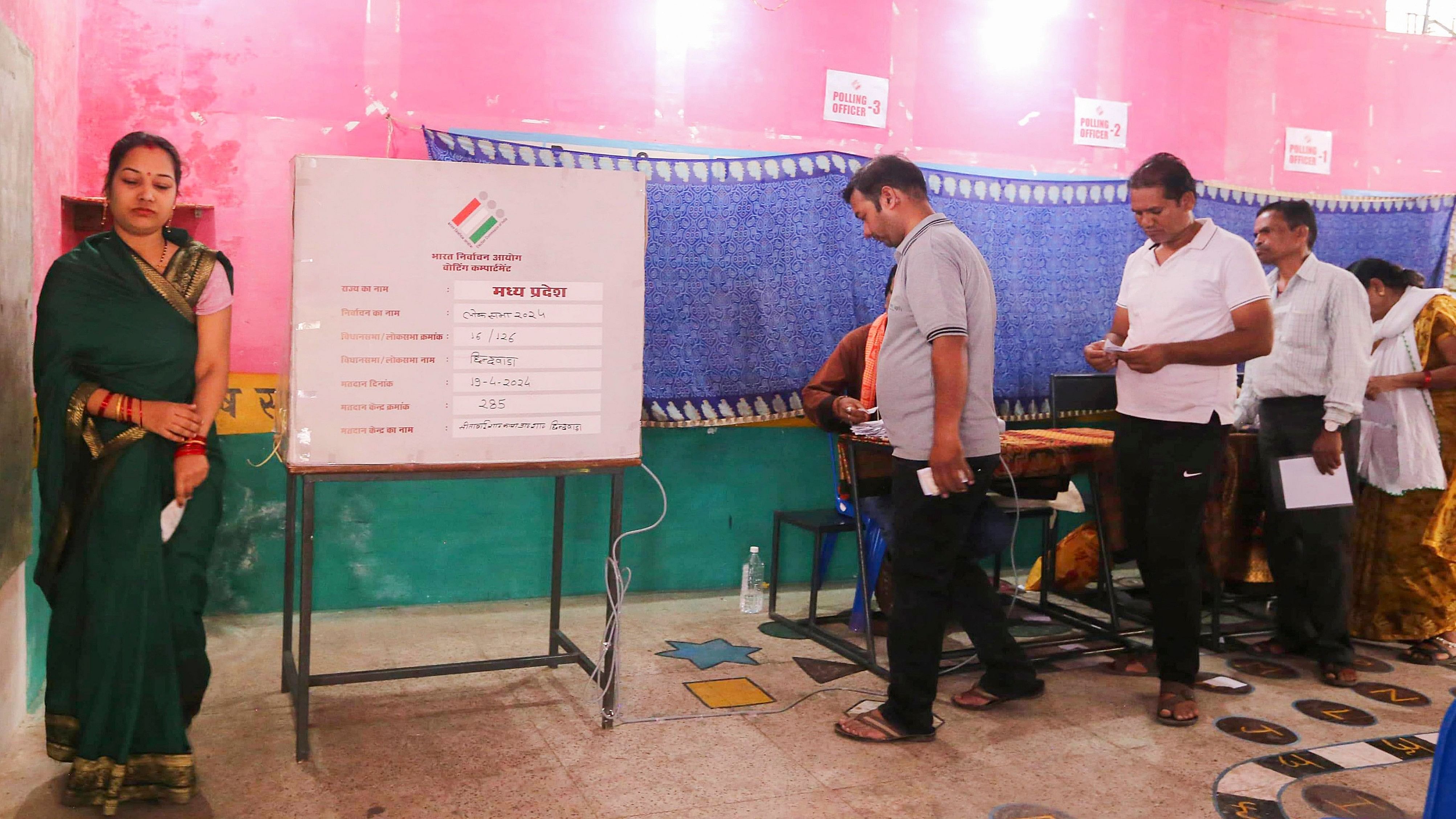 <div class="paragraphs"><p>Voters wait to cast their votes at a polling station during the first phase of Lok Sabha&nbsp;elections, in Chhindwara, Madhya Pradesh, Friday, April 19, 2024. </p></div>