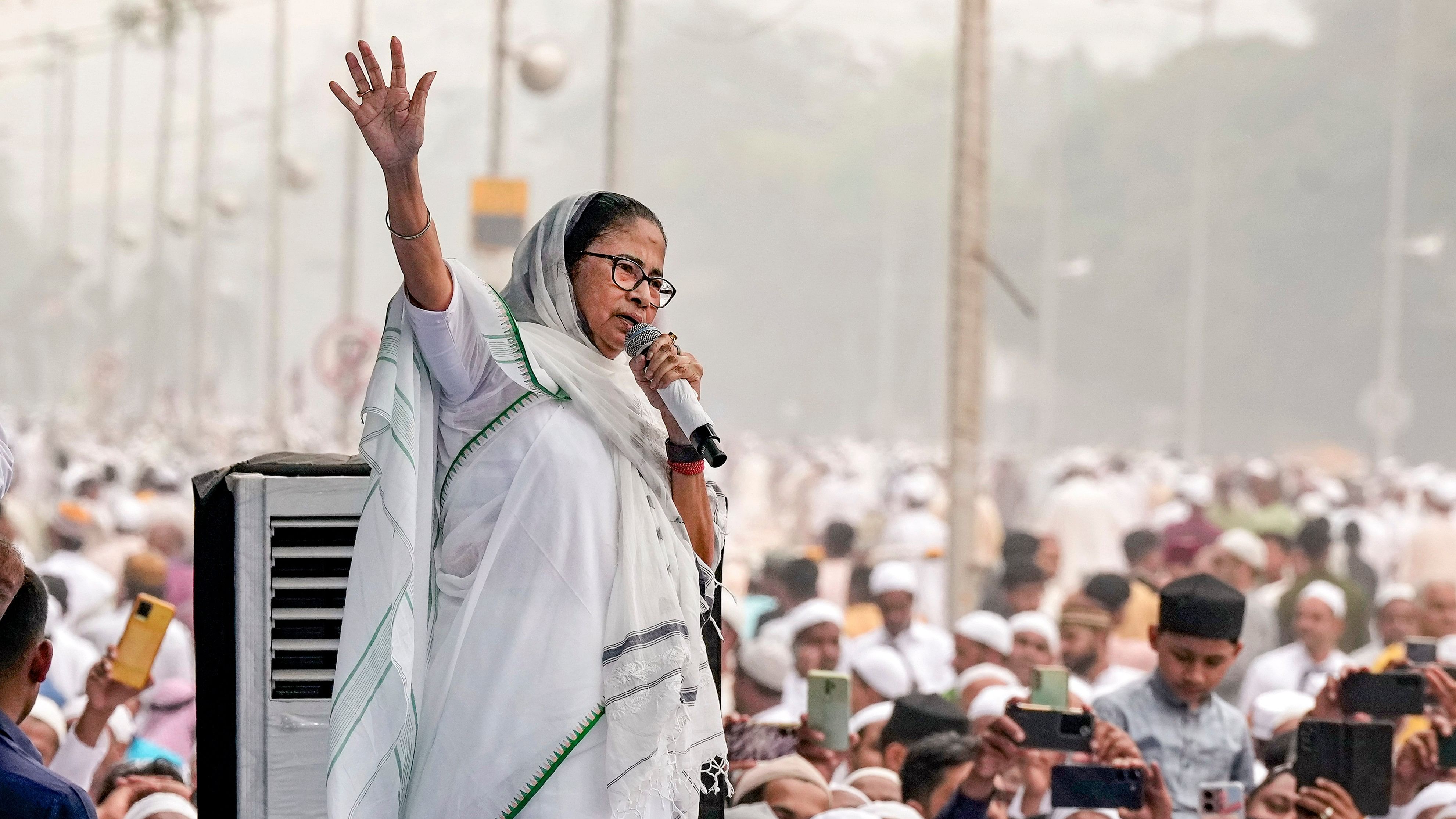<div class="paragraphs"><p>Kolkata: TMC Supremo and West Bengal Chief Minister Mamata Banerjee addresses people on the occasion of Eid-ul-Fitr festival in Kolkata, Thursday, April 11, 2024. </p></div>