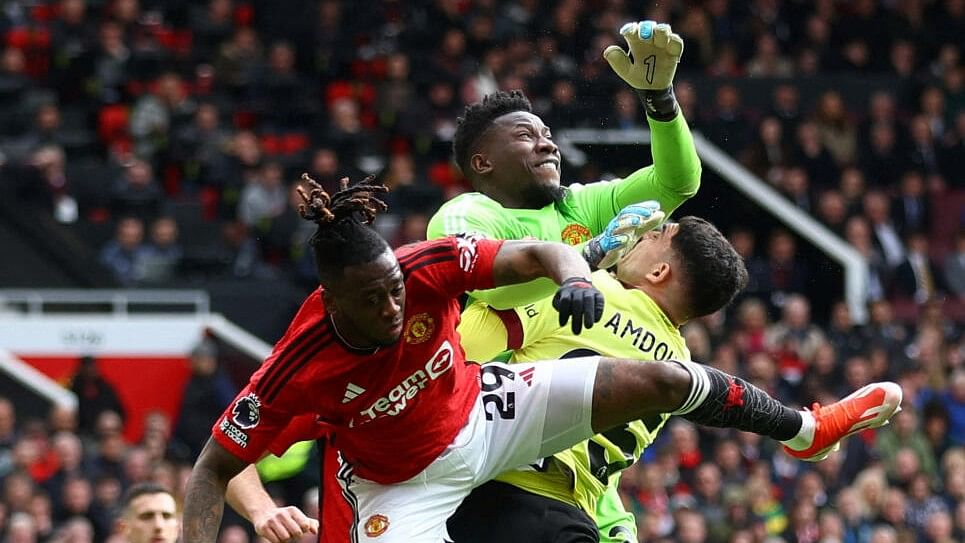 <div class="paragraphs"><p>Manchester United's Andre Onana fouls Burnley's Zeki Amdouni to concede a penalty.</p></div>