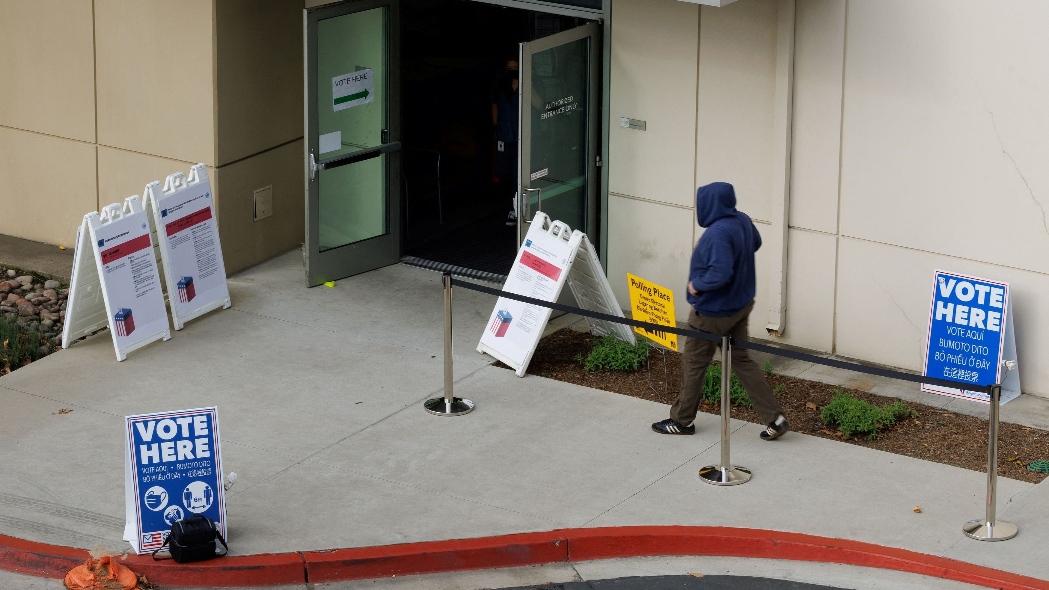 <div class="paragraphs"><p>A voter arrives at a polling station during the Super Tuesday primary election in San Diego, California.</p></div>