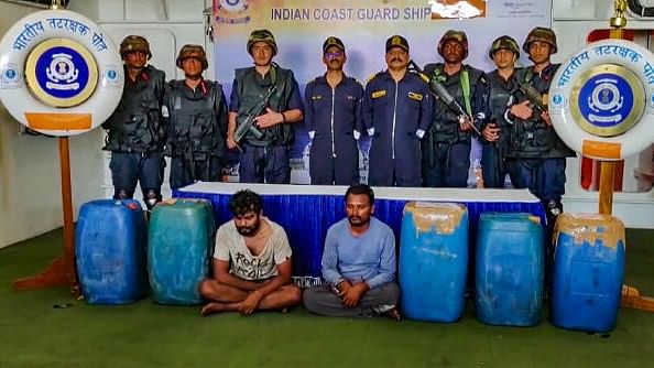 <div class="paragraphs"><p>Indian Coast Guard and Gujarat ATS personnel with the arrested accused of drug smuggling after the joint operation that resulted in the seizure of a large quantity of drugs on Monday, April 29.</p></div>