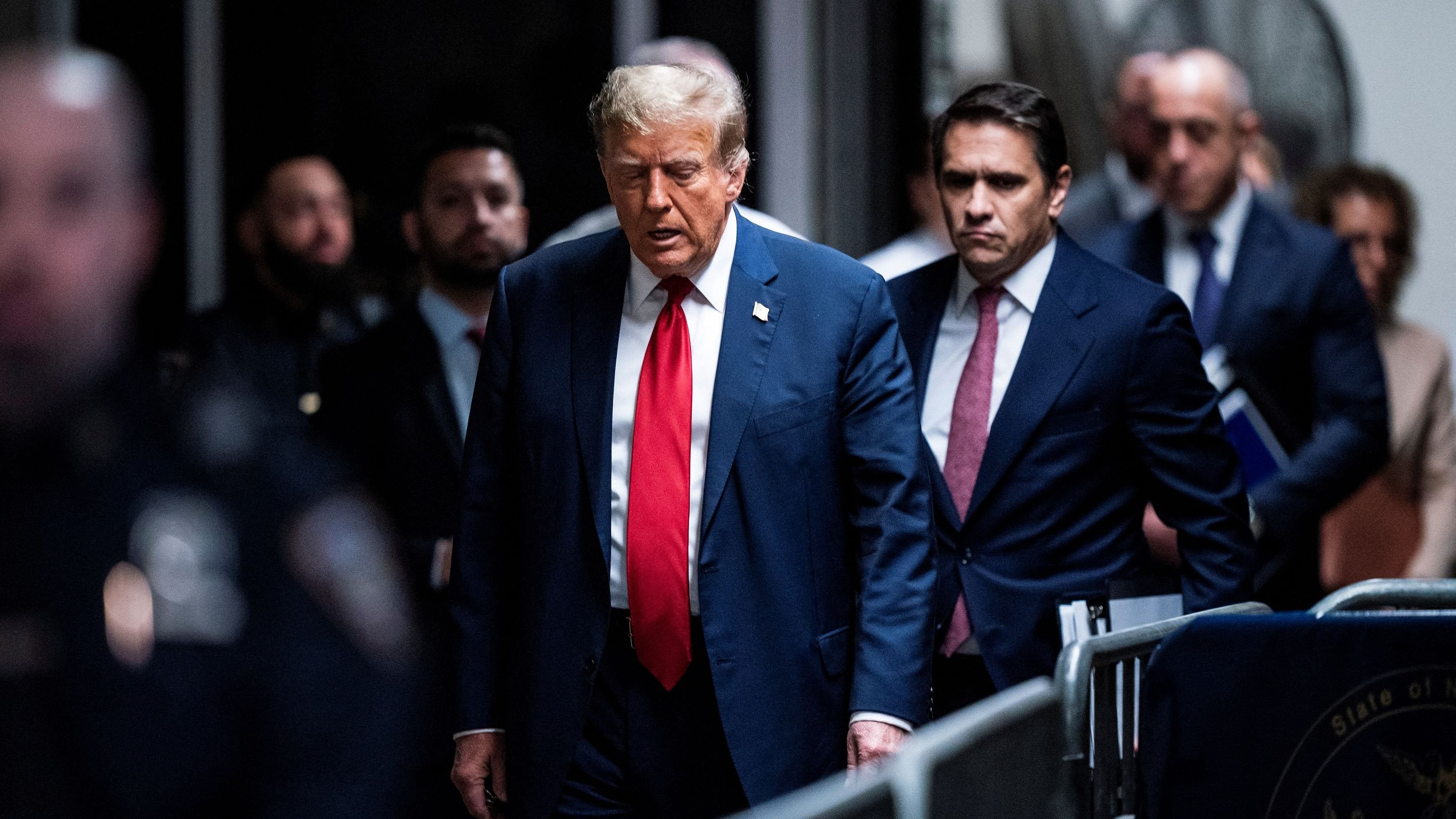 <div class="paragraphs"><p>Former US President Donald Trump arrives at Manhattan criminal court with his legal team ahead of the start of jury selection in New York, NY,  on Monday, April 15, 2024. Trump faces 34 felony counts of falsifying business records as part of an alleged scheme to silence claims of extramarital sexual encounters during his 2016 presidential campaign.  </p></div>