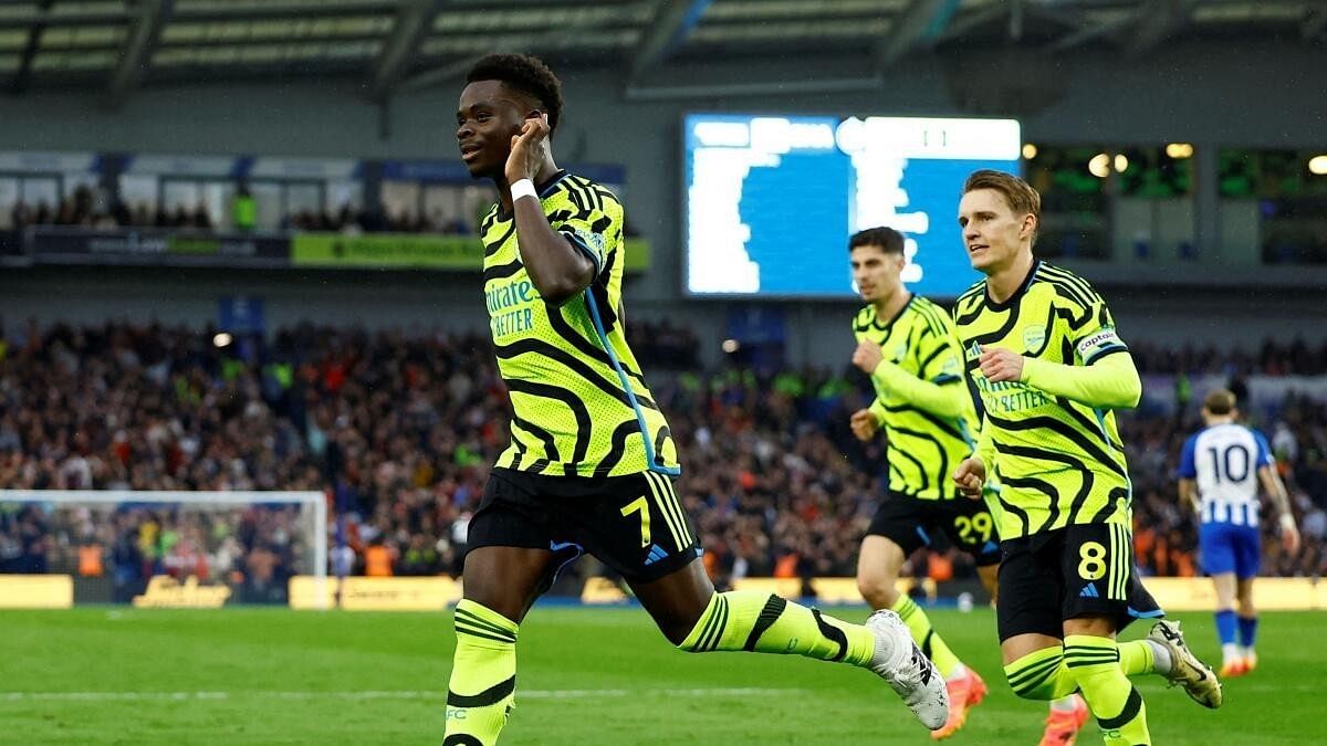 <div class="paragraphs"><p>Arsenal's Bukayo Saka celebrates scoring their first goal against Brighton Hove &amp; Albion on Saturday, April 6.</p></div>