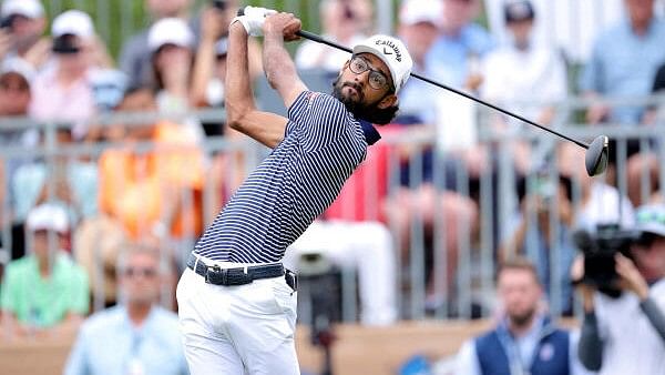 <div class="paragraphs"><p>Akshay Bhatia hits a tee shot at the first hole during the final round of the Valero Texas Open golf tournament.</p></div>