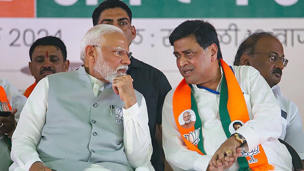 <div class="paragraphs"><p>Prime Minister Narendra Modi with senior leader Ashok Chavan during an election campaign rally in support of NDA candidates, in Nanded, Maharashtra.</p></div>
