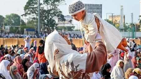 <div class="paragraphs"><p>A Muslim devotee with her child during Eid al-Fitr, marking the end of the holy month of Ramzan, in Kerala, on April 10. Representative image.</p></div>