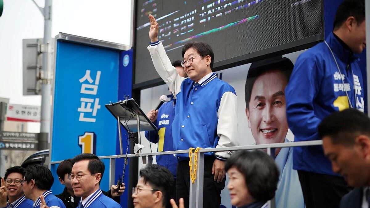 <div class="paragraphs"><p>Lee Jae-myung, leader of the main opposition Democratic Party, waves to supporters during a campaign rally for the upcoming 22nd parliamentary election in Seoul.</p></div>