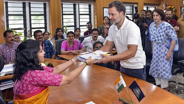<div class="paragraphs"><p>Congress candidate Rahul Gandhi files his nomination papers for the upcoming Lok Sabha elections, in Wayanad district, Wednesday, April 3, 2024. Congress leader Priyanka Gandhi Vadra is also seen.</p></div>