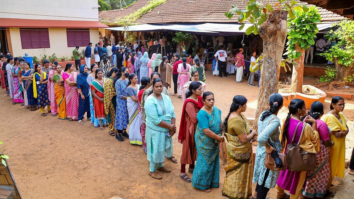 <div class="paragraphs"><p>Voters wait in a queue at a polling station in Kerala during the second phase of voting.&nbsp;</p></div>