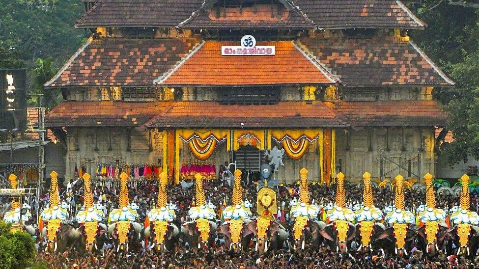 <div class="paragraphs"><p>Devotees gather during the celebration of the Thrissur Pooram festival,</p></div>