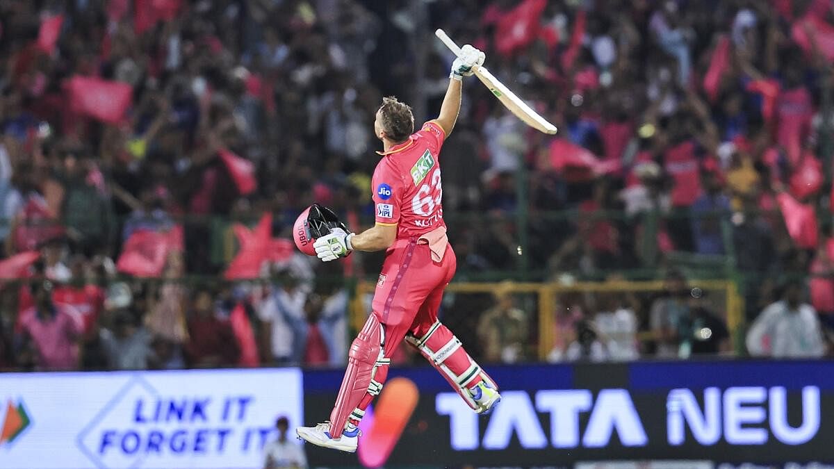 <div class="paragraphs"><p>Rajasthan Royals' Jos Buttler celebrates after scoring the winning runs to complete his century during the Indian Premier League (IPL) 2024 T20 cricket match between Rajasthan Royals and Royal Challengers Bengaluru at Sawai Mansingh Stadium, in Jaipur, Saturday, April 6, 2024.</p></div>