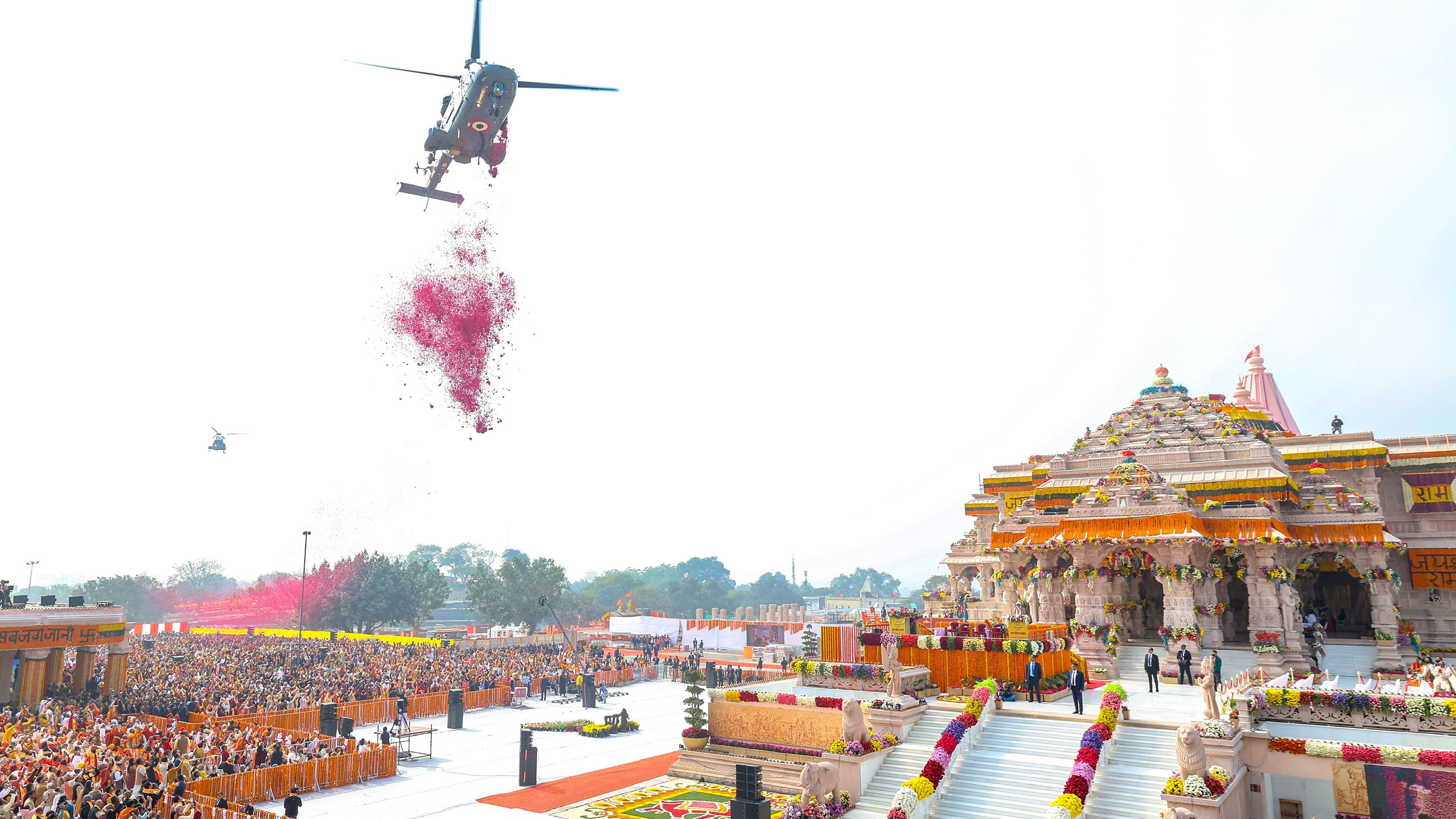 <div class="paragraphs"><p>File photo of a helicopter showering flower petals over Ram Temple during its consecration ceremony</p></div>