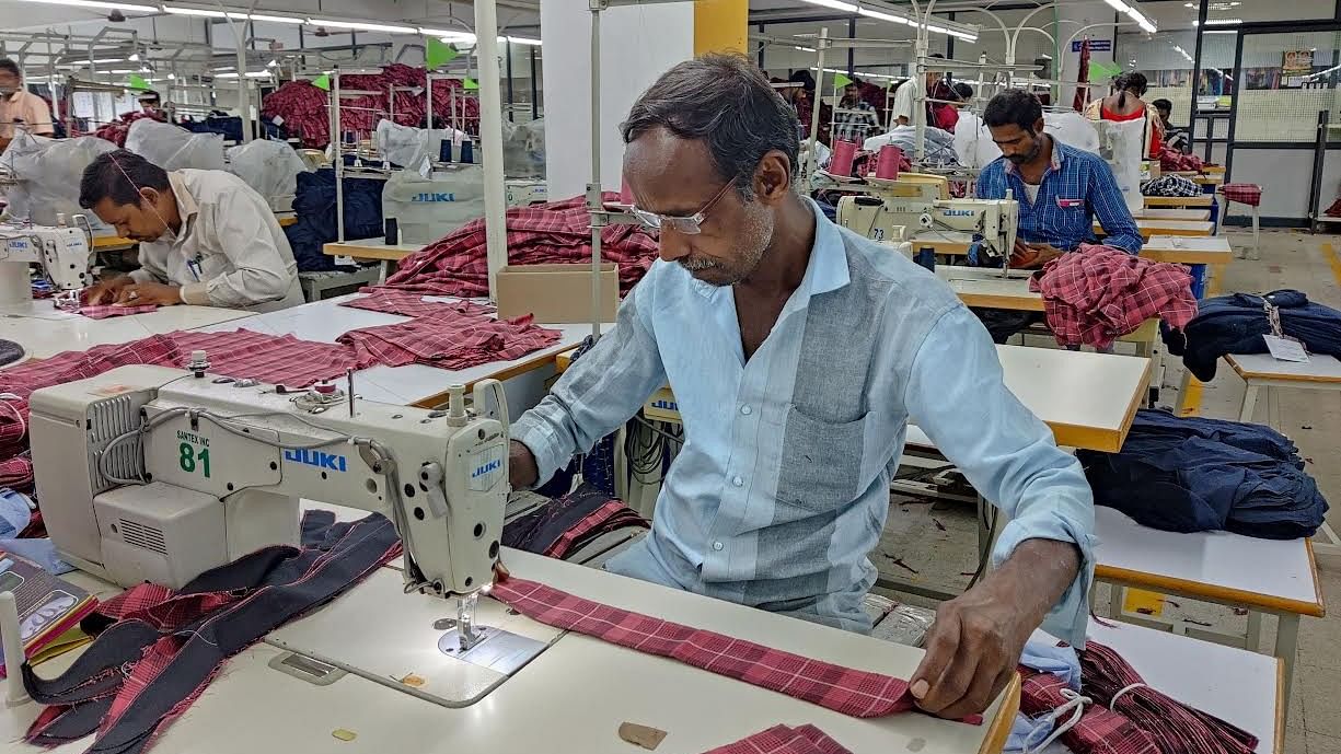 <div class="paragraphs"><p>Workers at a knitwear manufacturing unit in Tiruppur</p></div>