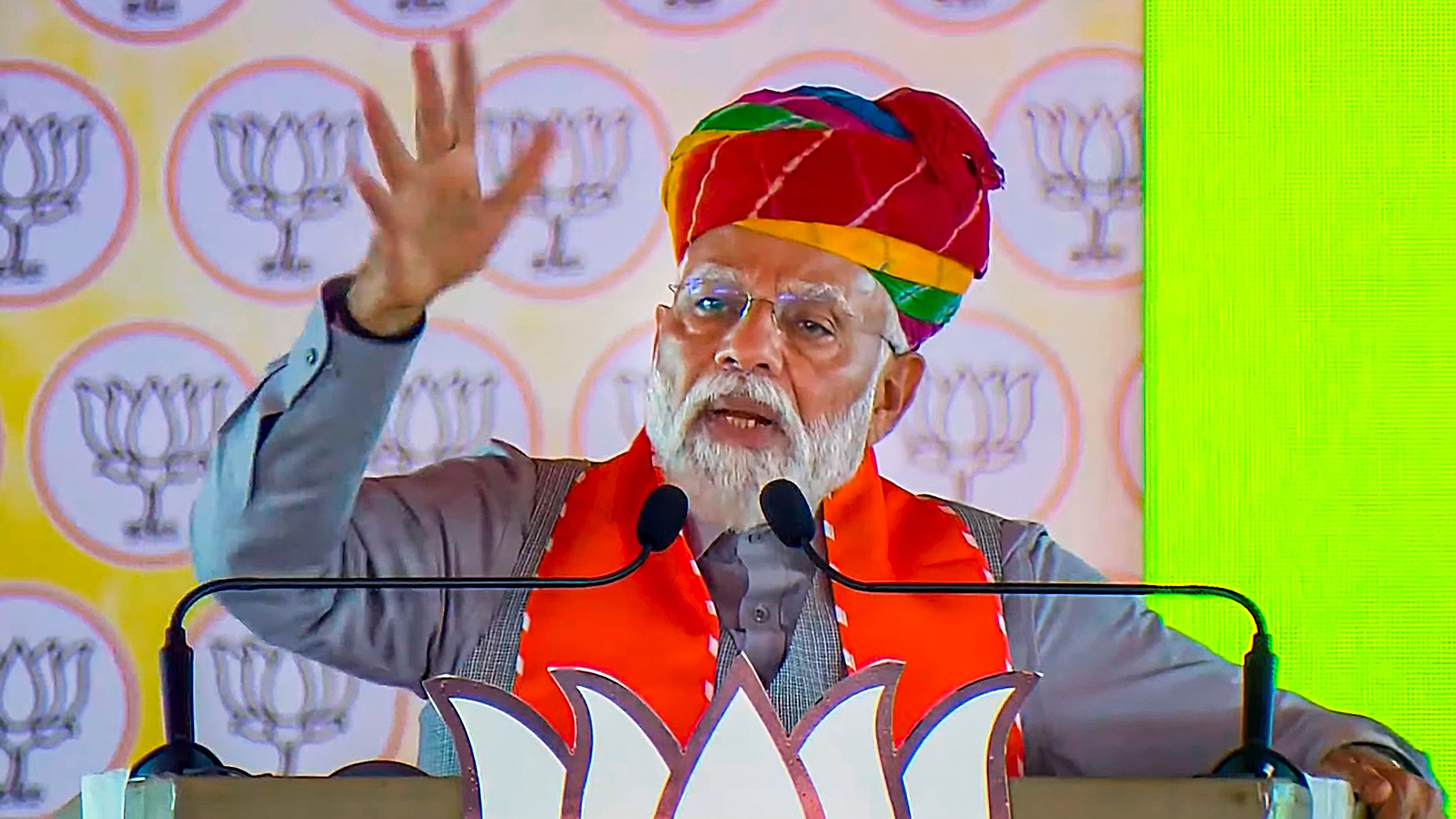 <div class="paragraphs"><p>Prime Minister Narendra Modi addresses a public meeting, ahead of the upcoming Lok Sabha elections, in Karauli, Thursday, April 11, 2024. </p></div>