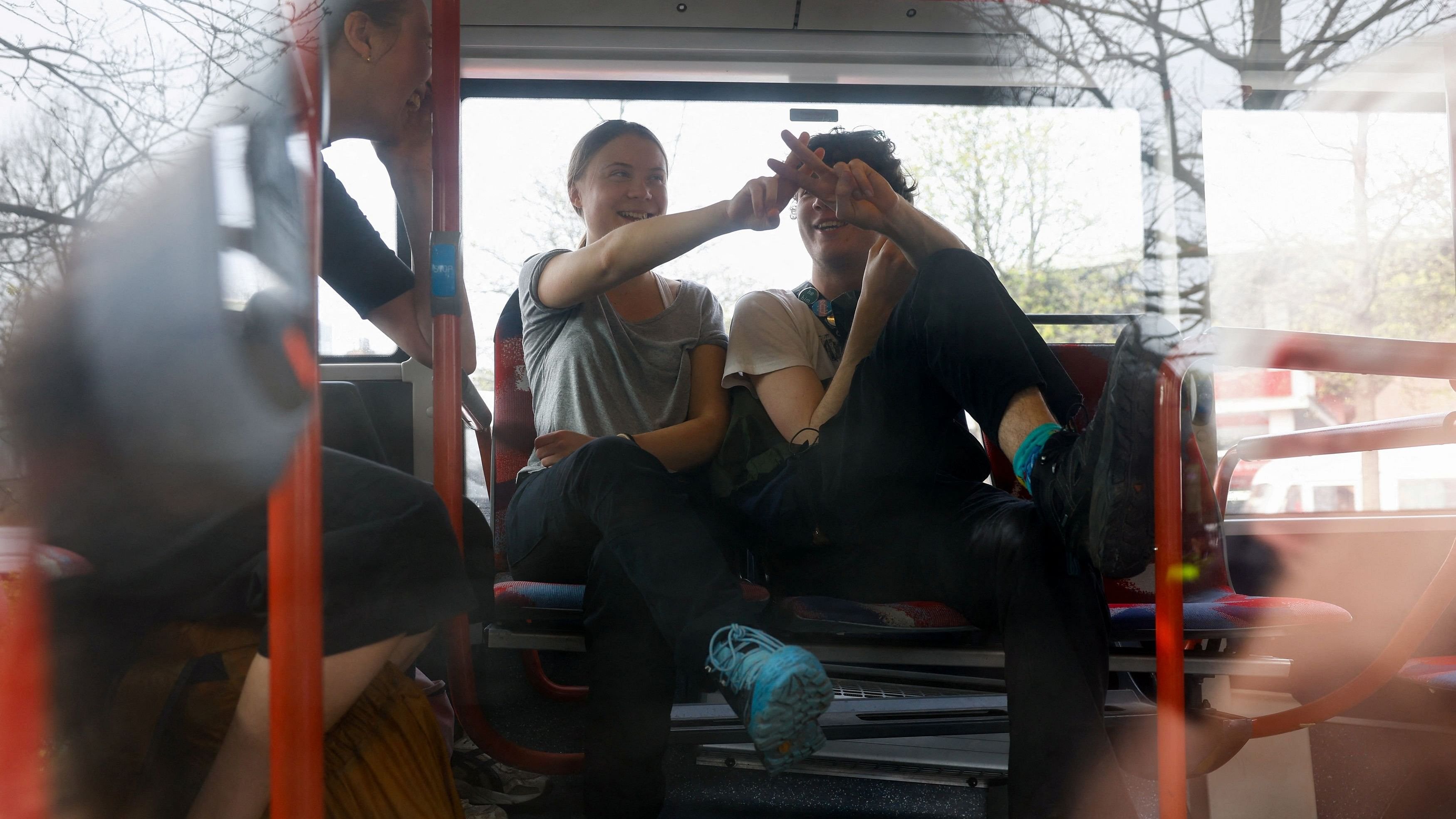 <div class="paragraphs"><p>Climate activist Greta Thunberg gestures as she sits in a bus with people detained by police, on the day they try to block the A12 highway to ensure that the Dutch government stops subsidies for fossil fuels, in The Hague, Netherlands, April 6, 2024. </p></div>