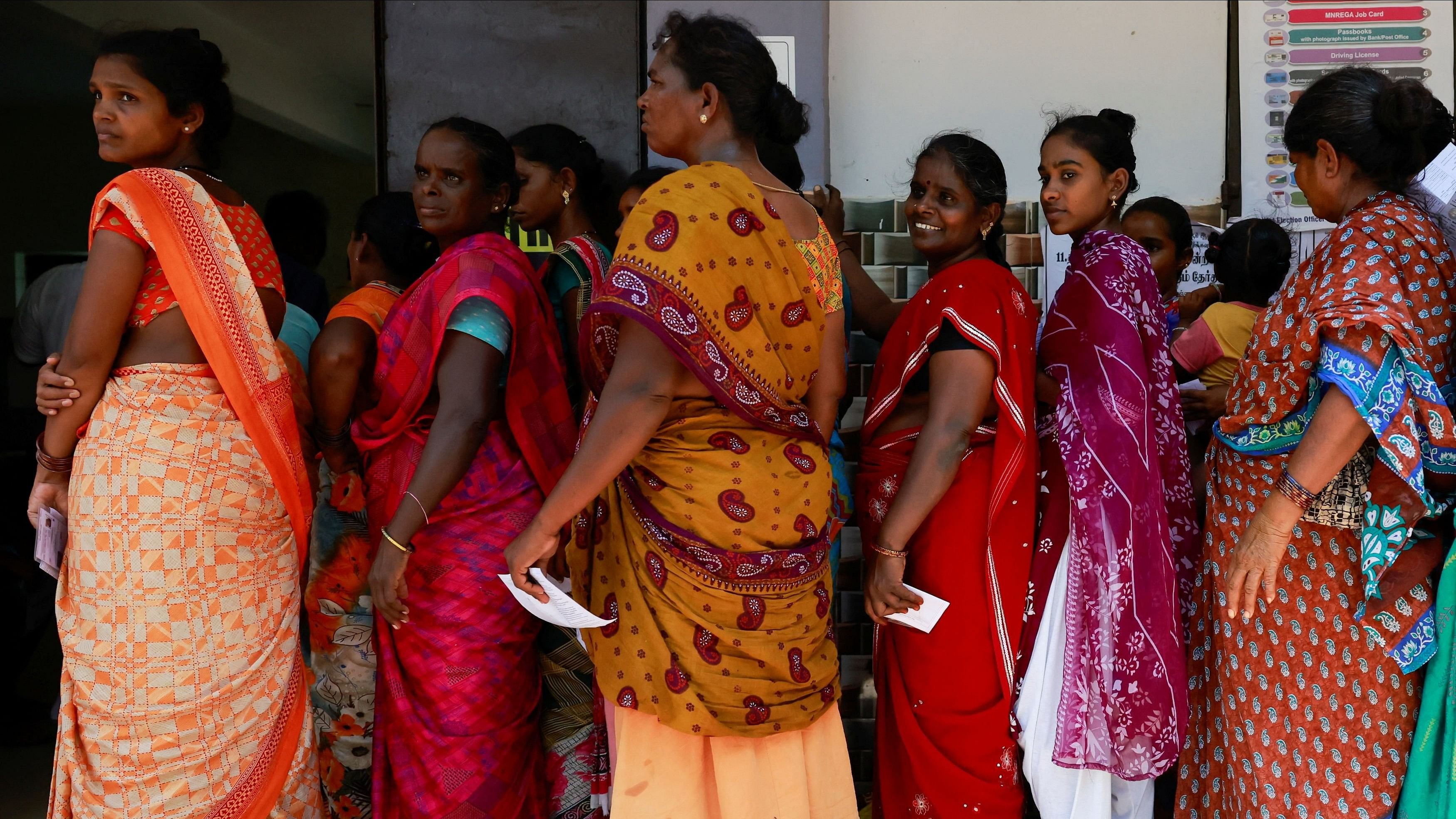 <div class="paragraphs"><p>Voters line up outside a polling station to vote during the first phase of the general election at Tiruvannamalai in Tamil Nadu, India, April 19, 2024. </p></div>