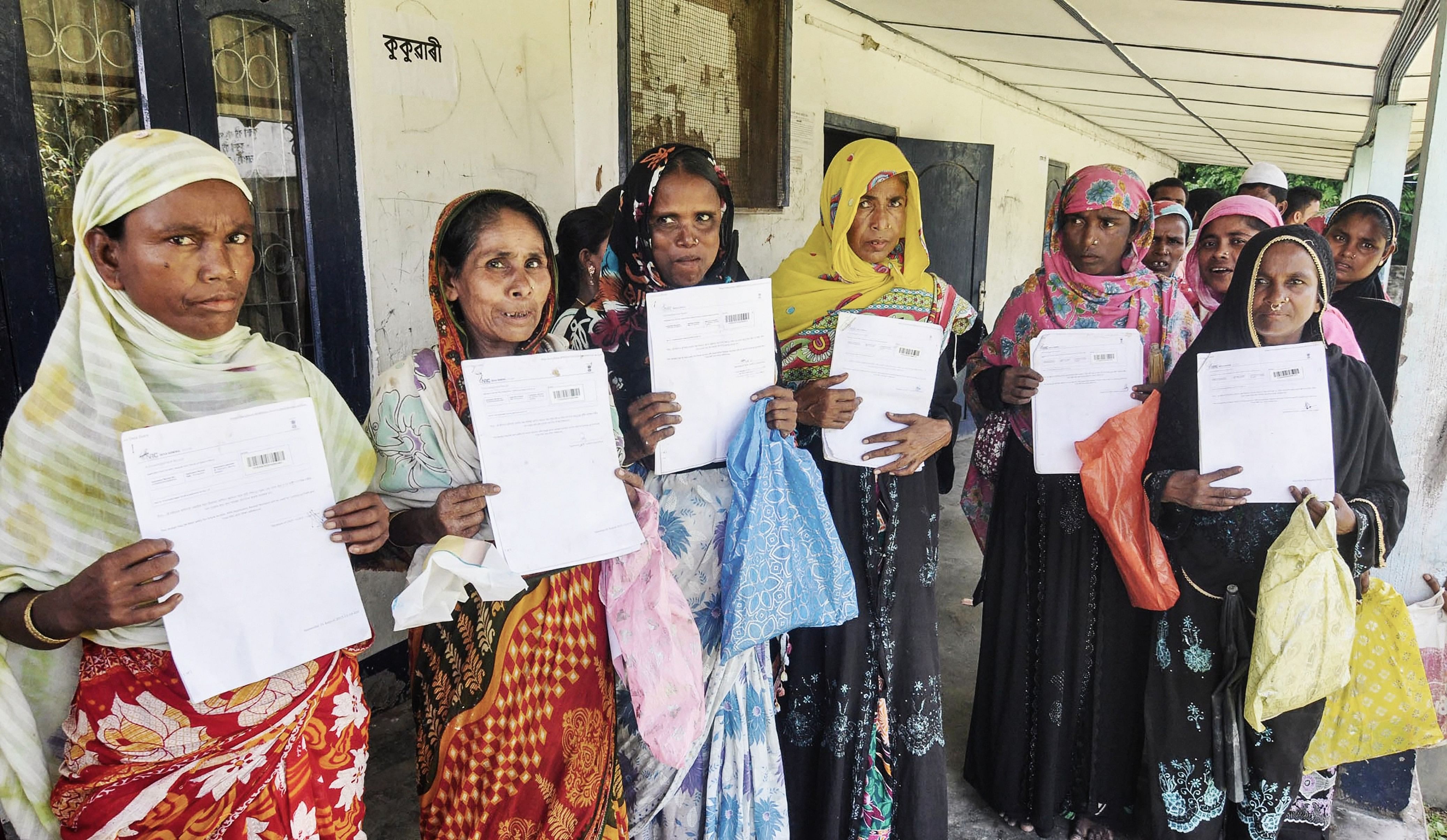 <div class="paragraphs"><p>File photo of people at the office to verify and check their names in the final draft of the National Register of Citizens (NRC), at Morigoan.</p></div>