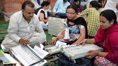 <div class="paragraphs"><p>Poll booth workers. For representation only</p></div>