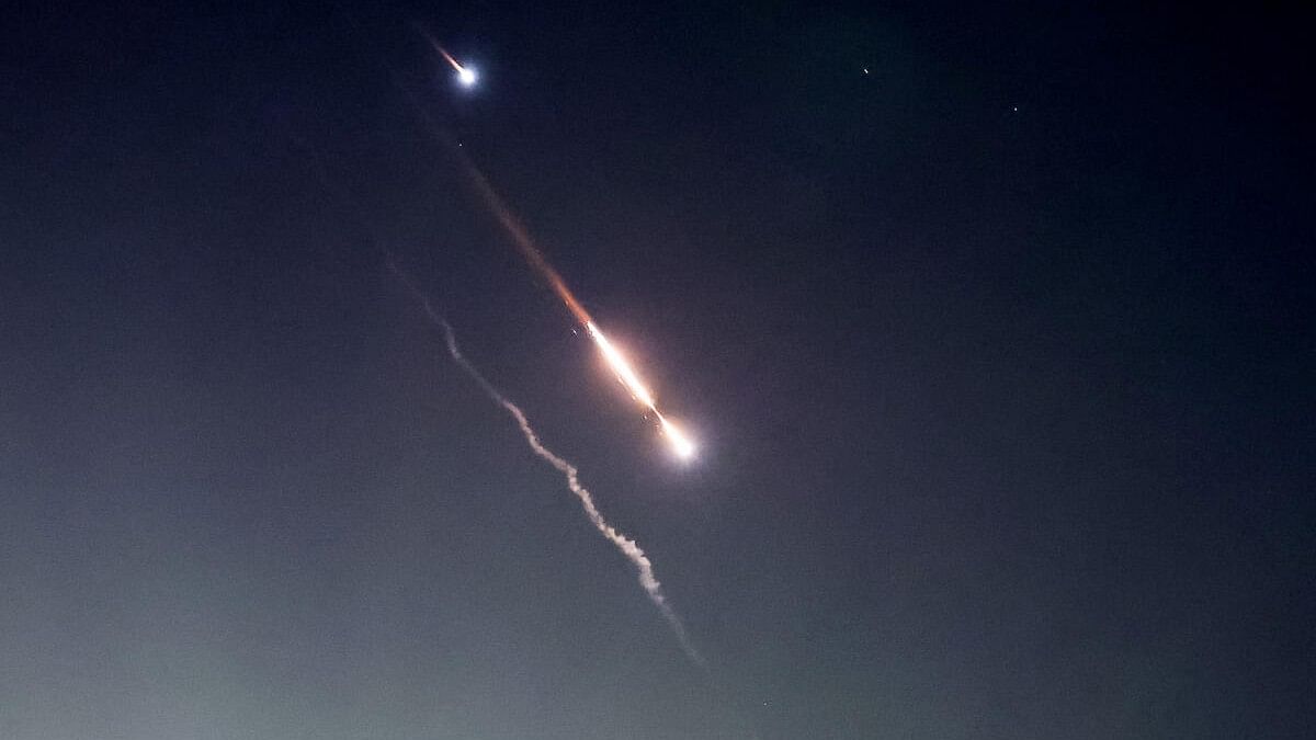 <div class="paragraphs"><p>Objects are seen in the sky above Jerusalem after Iran launched drones and missiles towards Israel, in Jerusalem April 14, 2024.</p></div>