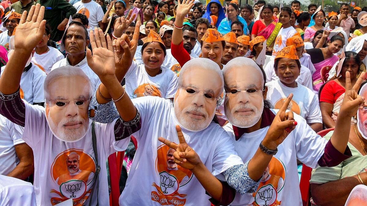 <div class="paragraphs"><p>BJP supporters attend Prime Minister Narendra Modi's public meeting ahead of Lok Sabha elections, in Nalbari district, Assam, Wednesday, April 17, 2024.</p></div>