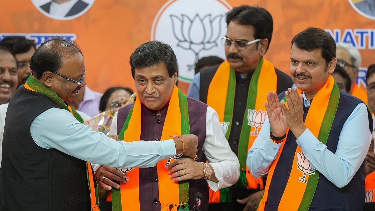 <div class="paragraphs"><p>File photo of Ashok Chavan joining the BJP in the presence of Maharashtra Deputy CM Devendra Fadnavis and Maharashtra BJP President Chandrashekar Bawankule, in Mumbai.&nbsp;</p></div>