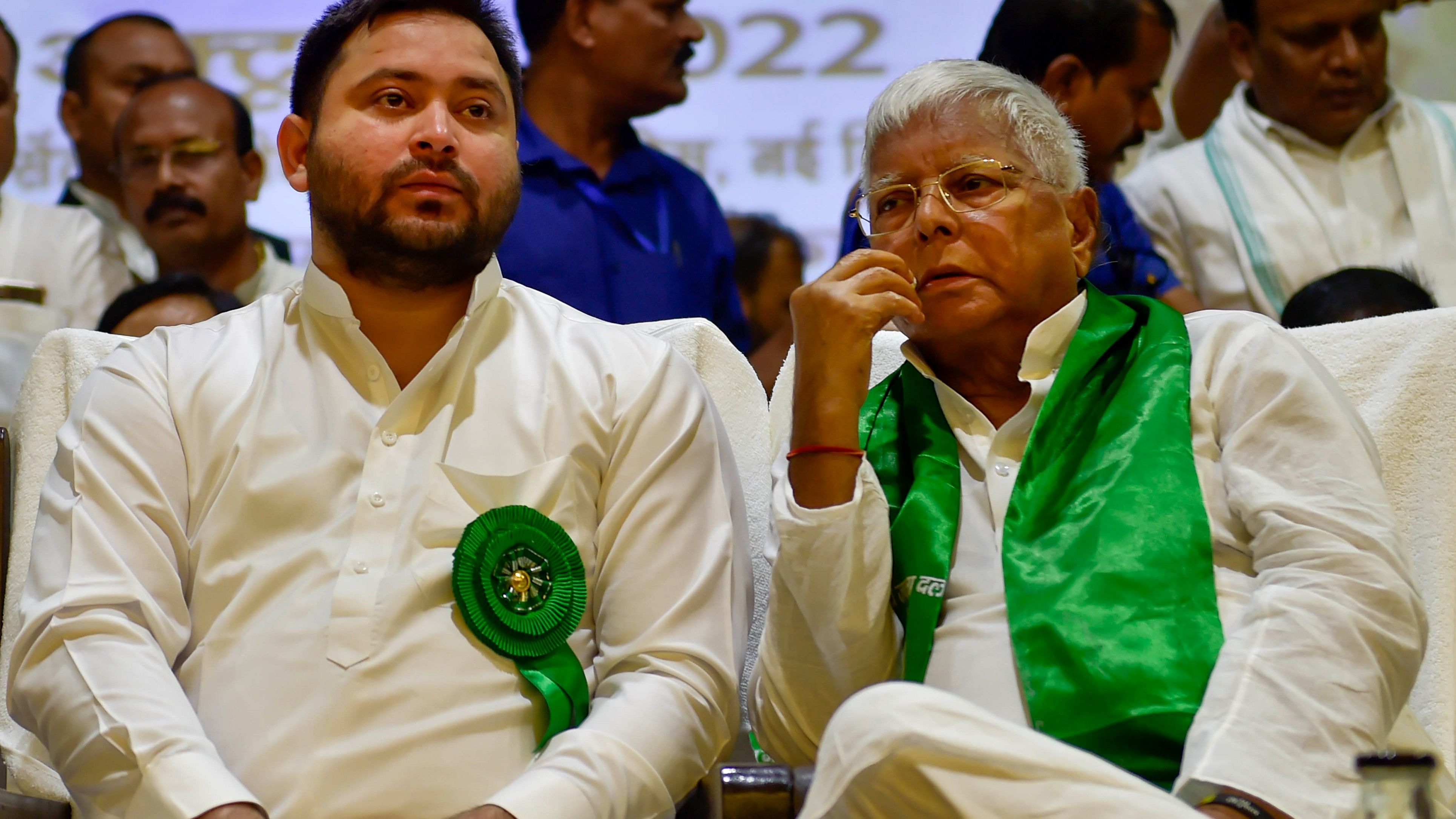 <div class="paragraphs"><p>File photo of&nbsp;RJD chief Lalu Prasad with party leader Tejashwi Yadav.</p></div>