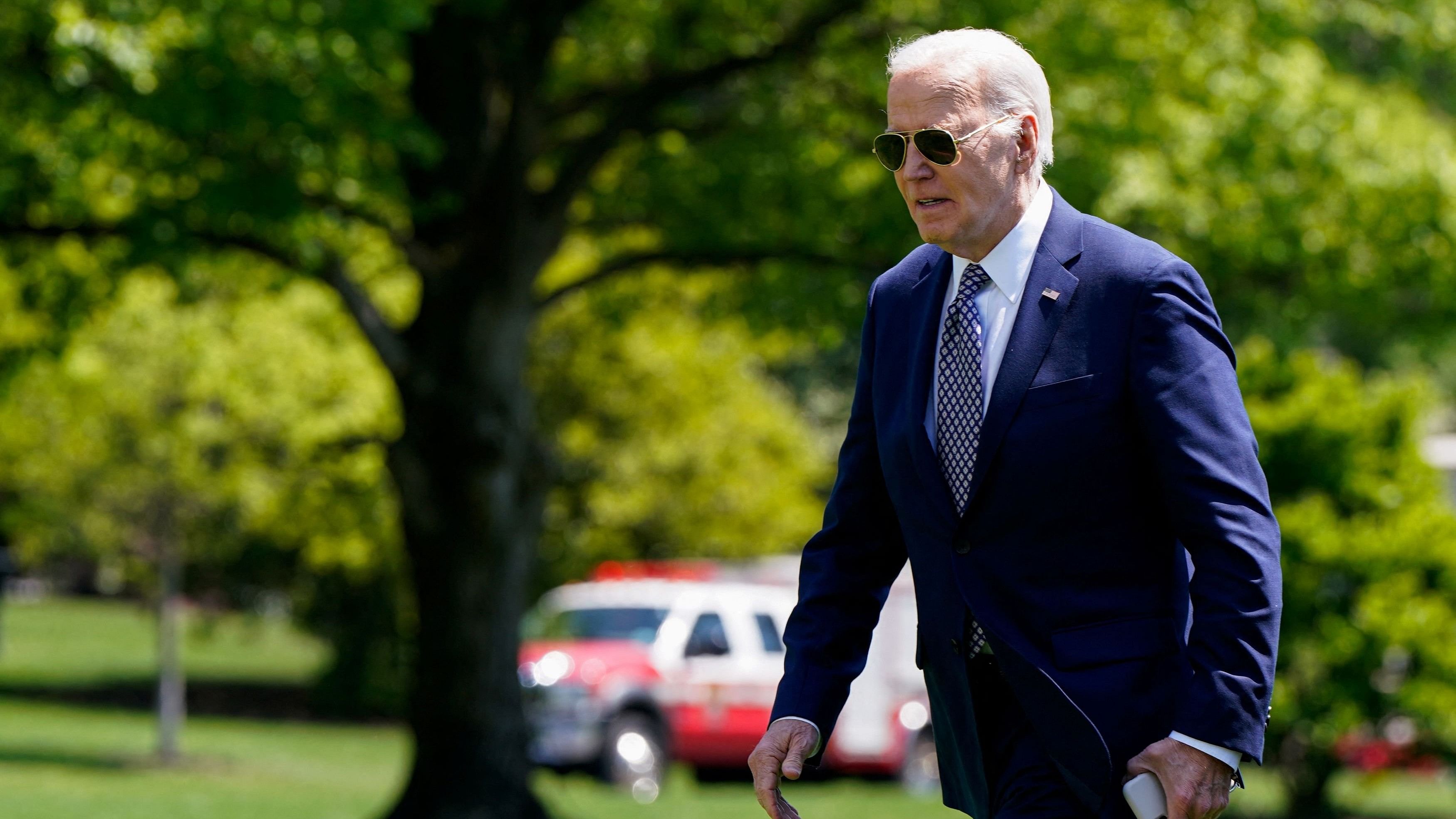 <div class="paragraphs"><p>US President Joe Biden walks back to the White House after disembarking from Marine One, Washington, US.</p></div>