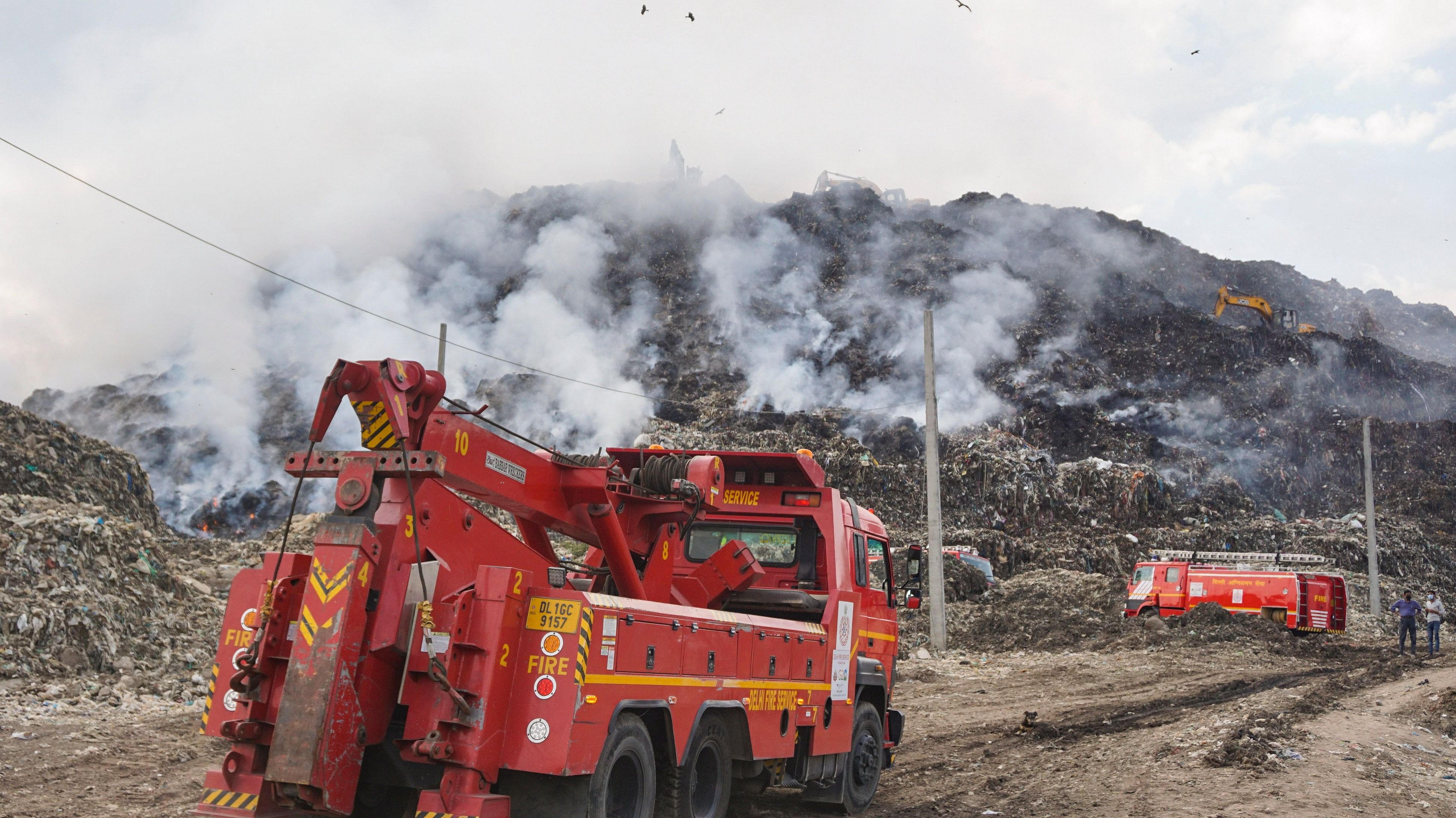 <div class="paragraphs"><p> Firefighters at the Ghazipur landfill site where a fire broke out on Sunday, in New Delhi, Monday, April 22, 2024. </p></div>