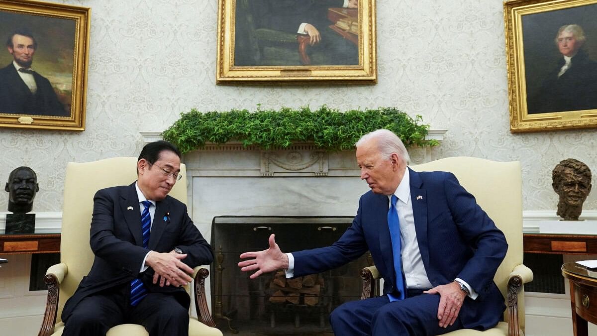<div class="paragraphs"><p>US President Joe Biden (right) greets Japanese Prime Minister Fumio Kishida in the Oval Office at the White House in Washington on Wednesday, April 10, 2024.</p></div>
