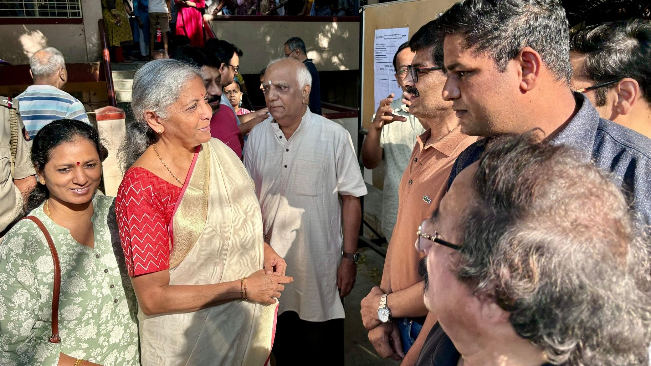 <div class="paragraphs"><p>Nirmala Sitharaman&nbsp;interacting with voters at the polling booth in Jayanagar, Bengaluru.</p></div>
