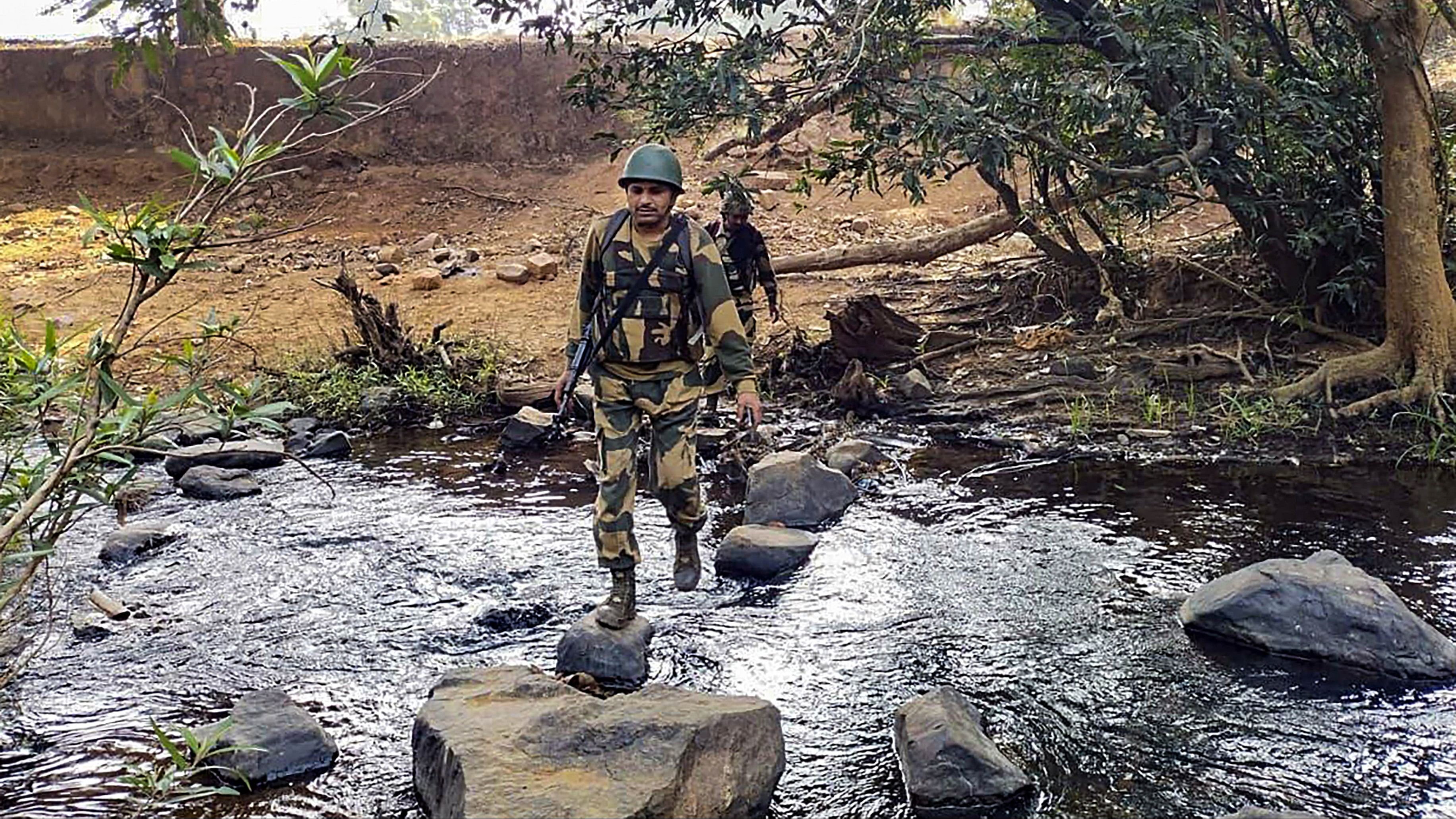 <div class="paragraphs"><p>Security personnel during an encounter with Naxalites, in Kanker district, on Tuesday.</p></div>