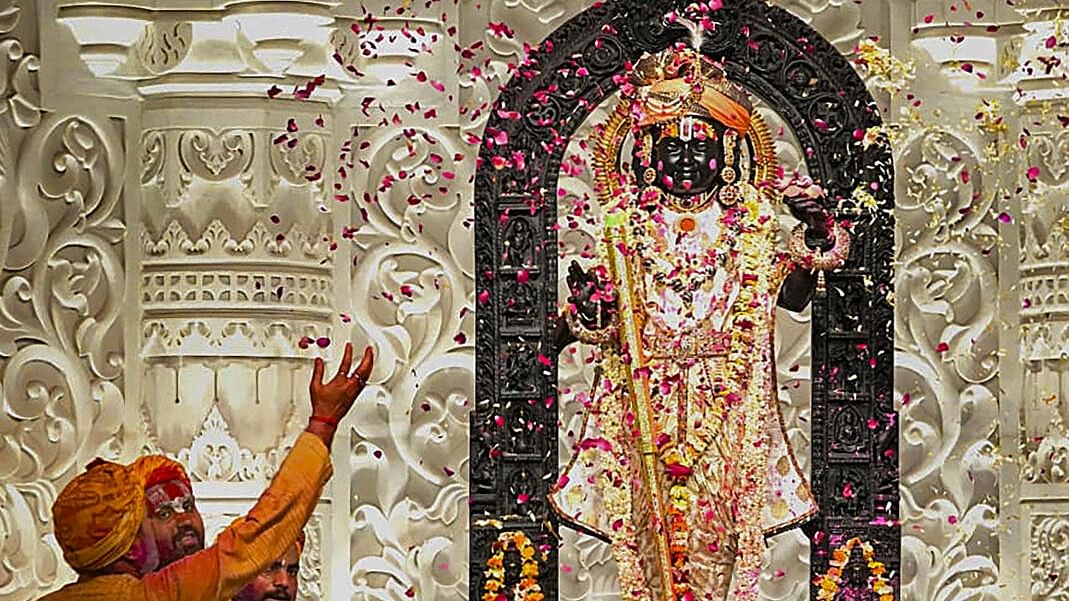 <div class="paragraphs"><p>Flower petals being showered on the idol of Ram Lalla during 'Rangotsav' celebrations at the Ram Temple, in Ayodhya.&nbsp;</p></div>