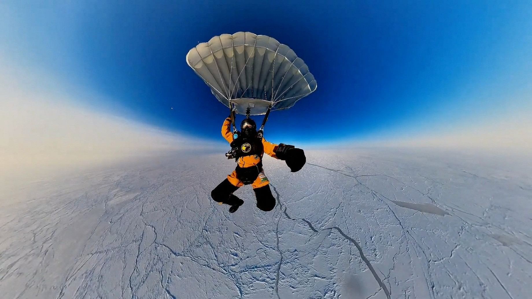 <div class="paragraphs"><p>Denis Yefremov, space technology engineer, performs a parachute jump from the Earth's stratosphere to the area near the Russian polar station Barneo close to the North Pole, April 12, 2024, in this still image taken from video.</p></div>
