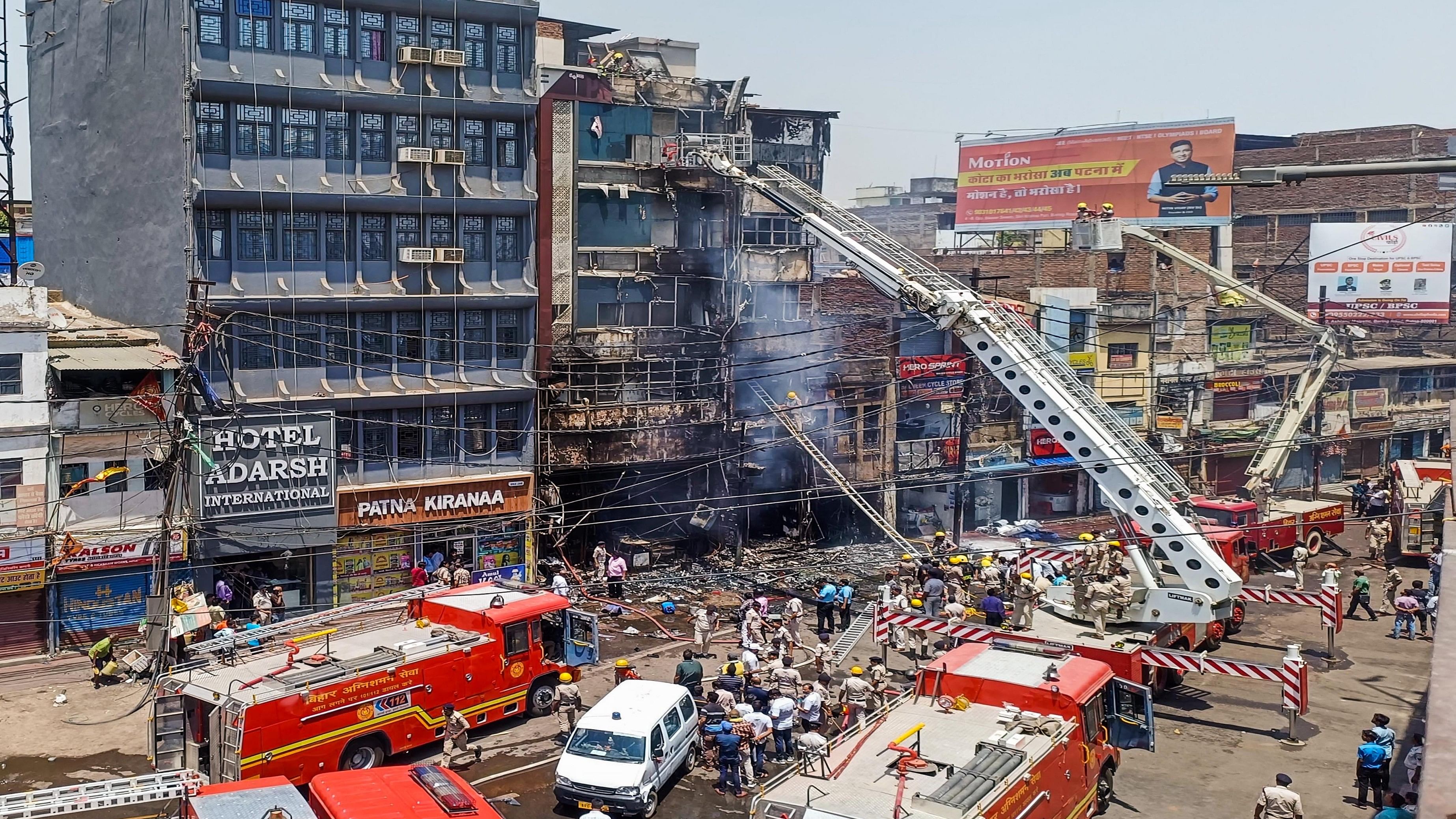 <div class="paragraphs"><p>Firefighters douse a fire which broke out in a hotel near the Patna Junction railway station, in Patna, Thursday.</p></div>