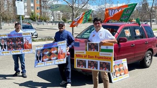 <div class="paragraphs"><p>Members and supporters of the Overseas Friends of BJP take part in a car rally in support of Prime Minister Narendra Modi ahead of upcoming Lok Sabha elections in India, in USA.</p></div>