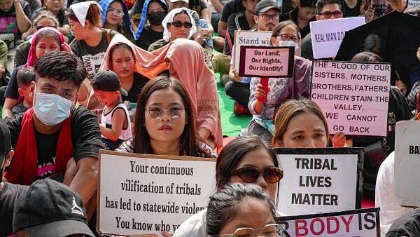 <div class="paragraphs"><p>Members of the Kuki-Zo Women's Forum protest at Jantar Mantar demanding a separate administration for the tribal population of Manipur living in its hill districts, in New Delhi, Friday, July 28, 2023.</p></div>