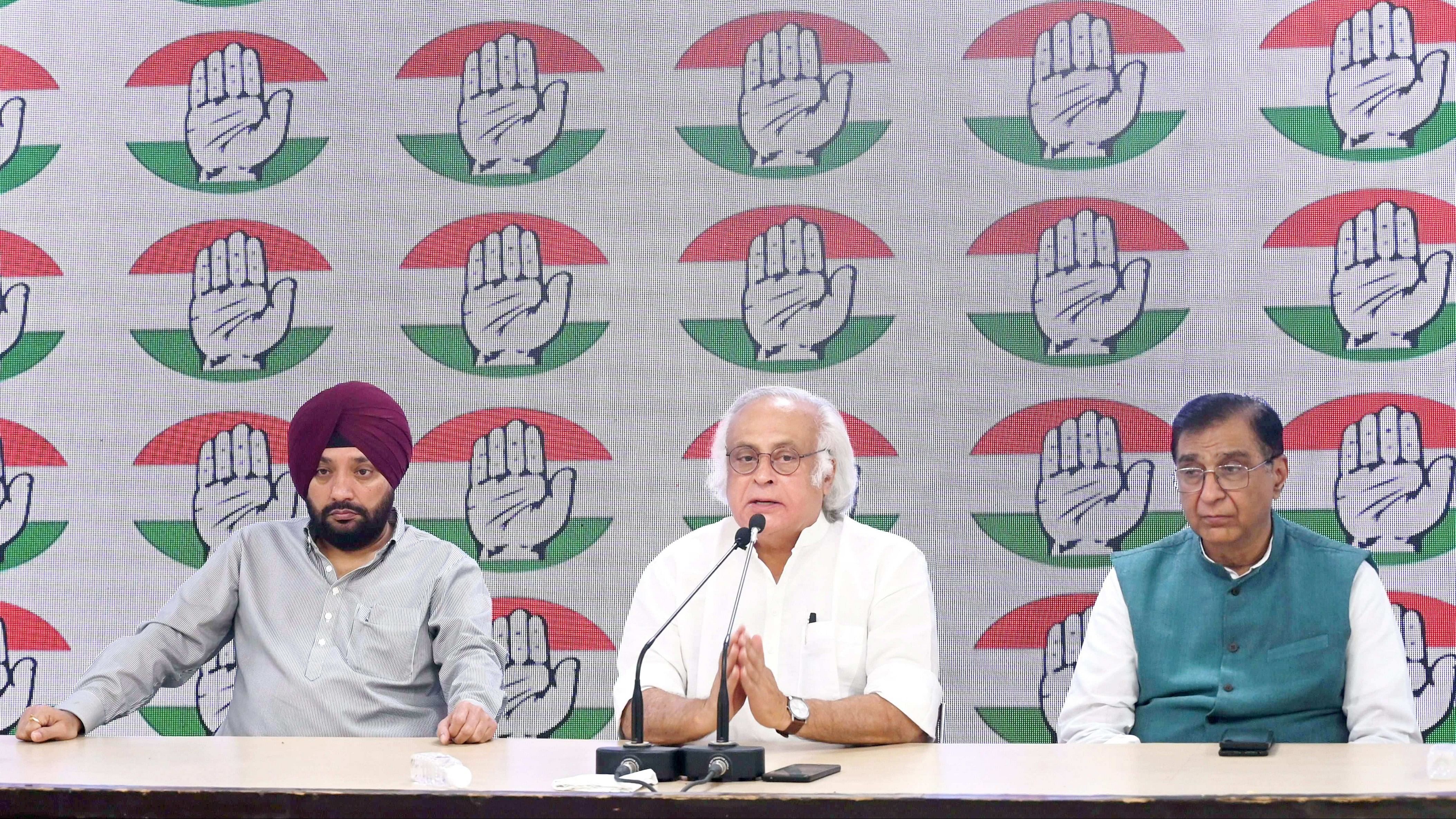 <div class="paragraphs"><p>Congress leaders Jairam Ramesh, Arvinder Singh Lovely and Deepak Babaria during a press conference, in New Delhi, on Saturday.</p></div>